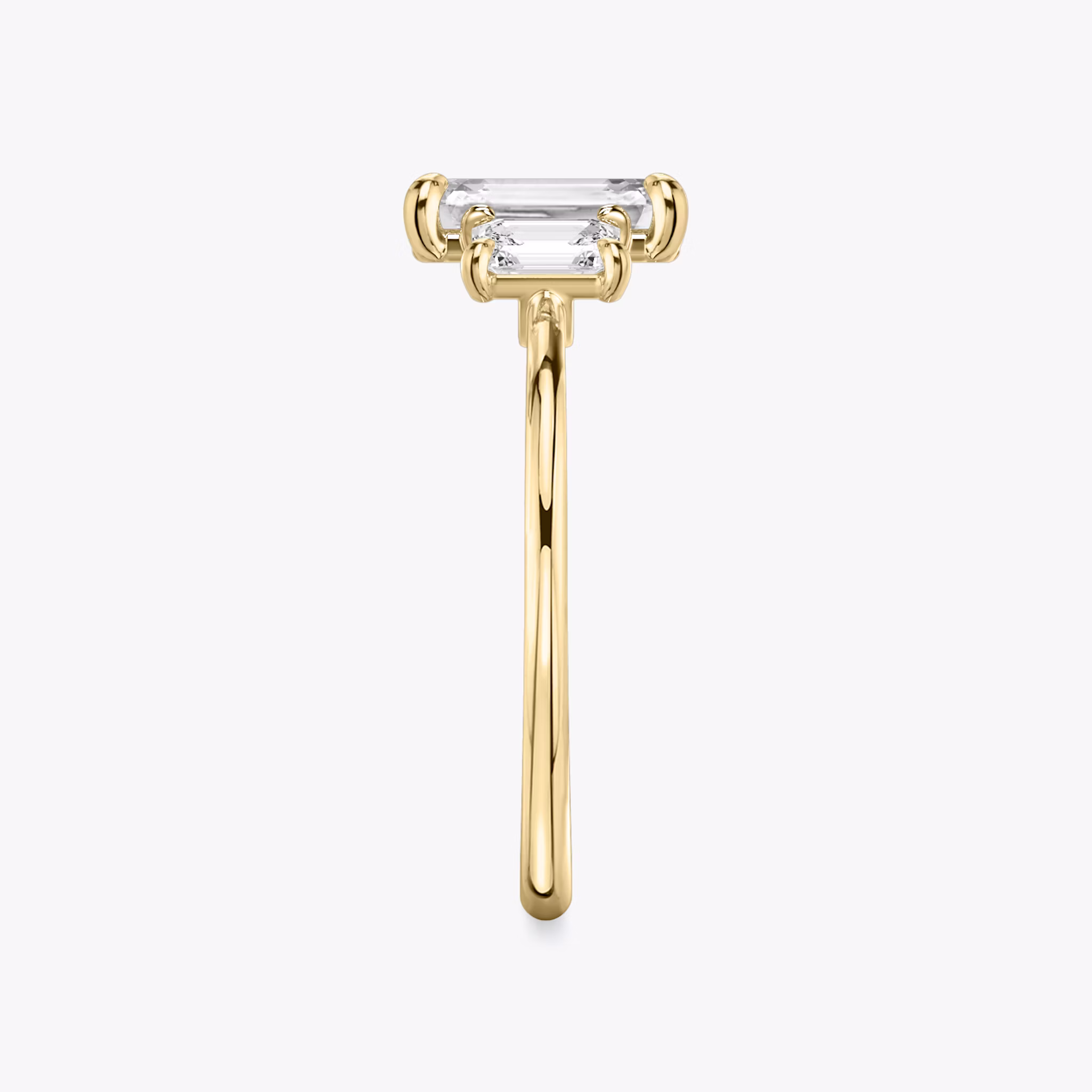 The Three Stone | Emerald | 18k | Yellow Gold | bandAccent: Plain | sideStoneCarat: 0.25ct | sideStoneShape: Emerald | diamondOrientation: vertical | caratWeight: other