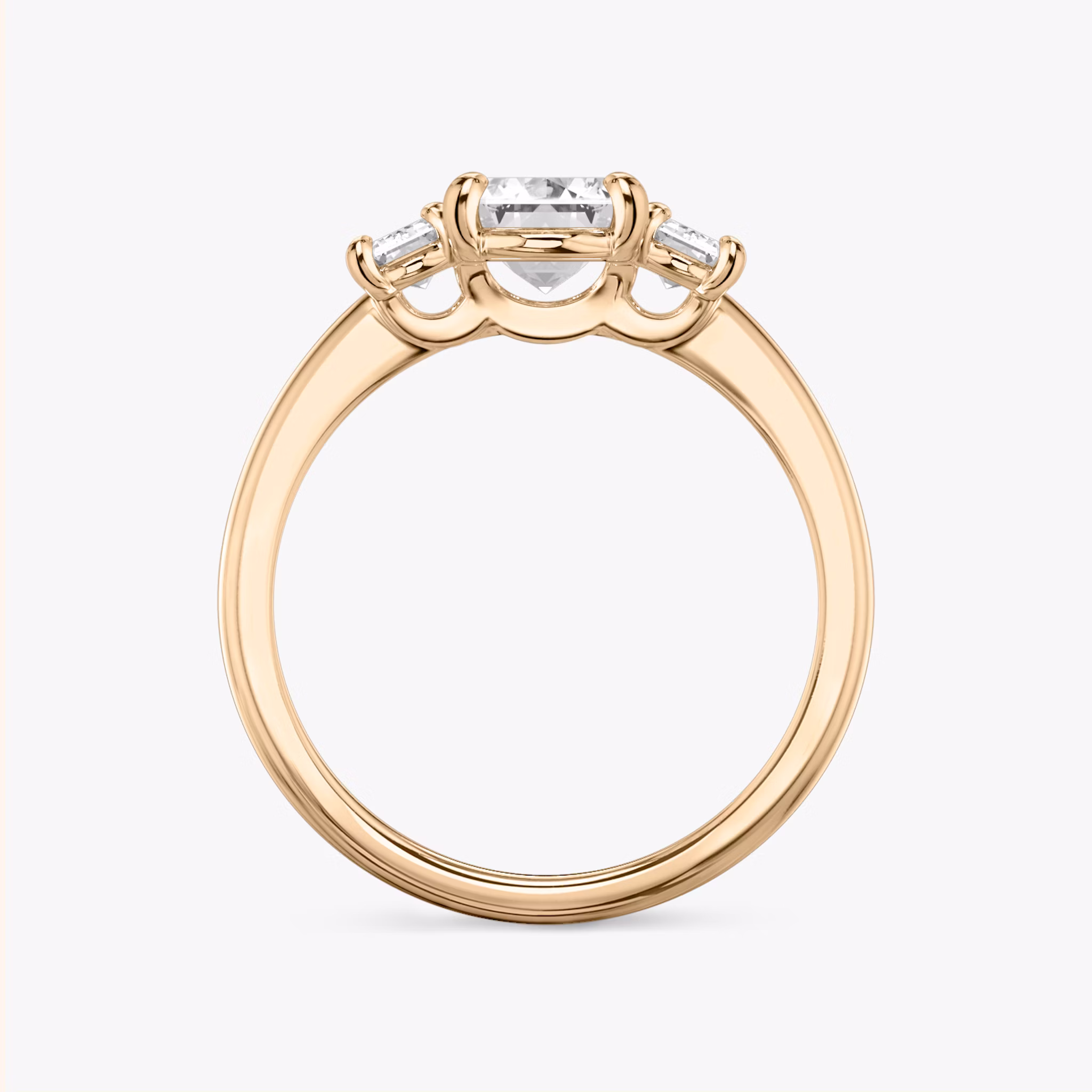 The Three Stone | Emerald | 14k | Rose Gold | bandAccent: Plain | sideStoneCarat: 0.25ct | sideStoneShape: Emerald | diamondOrientation: vertical | caratWeight: other