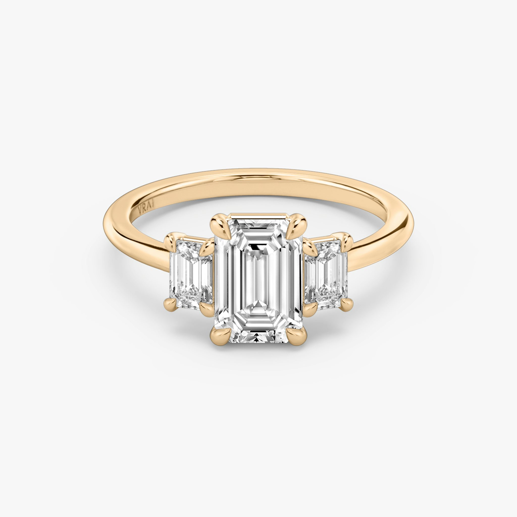 The Three Stone | Emerald | 14k | Rose Gold | bandAccent: Plain | sideStoneCarat: 0.25ct | sideStoneShape: Emerald | diamondOrientation: vertical | caratWeight: other