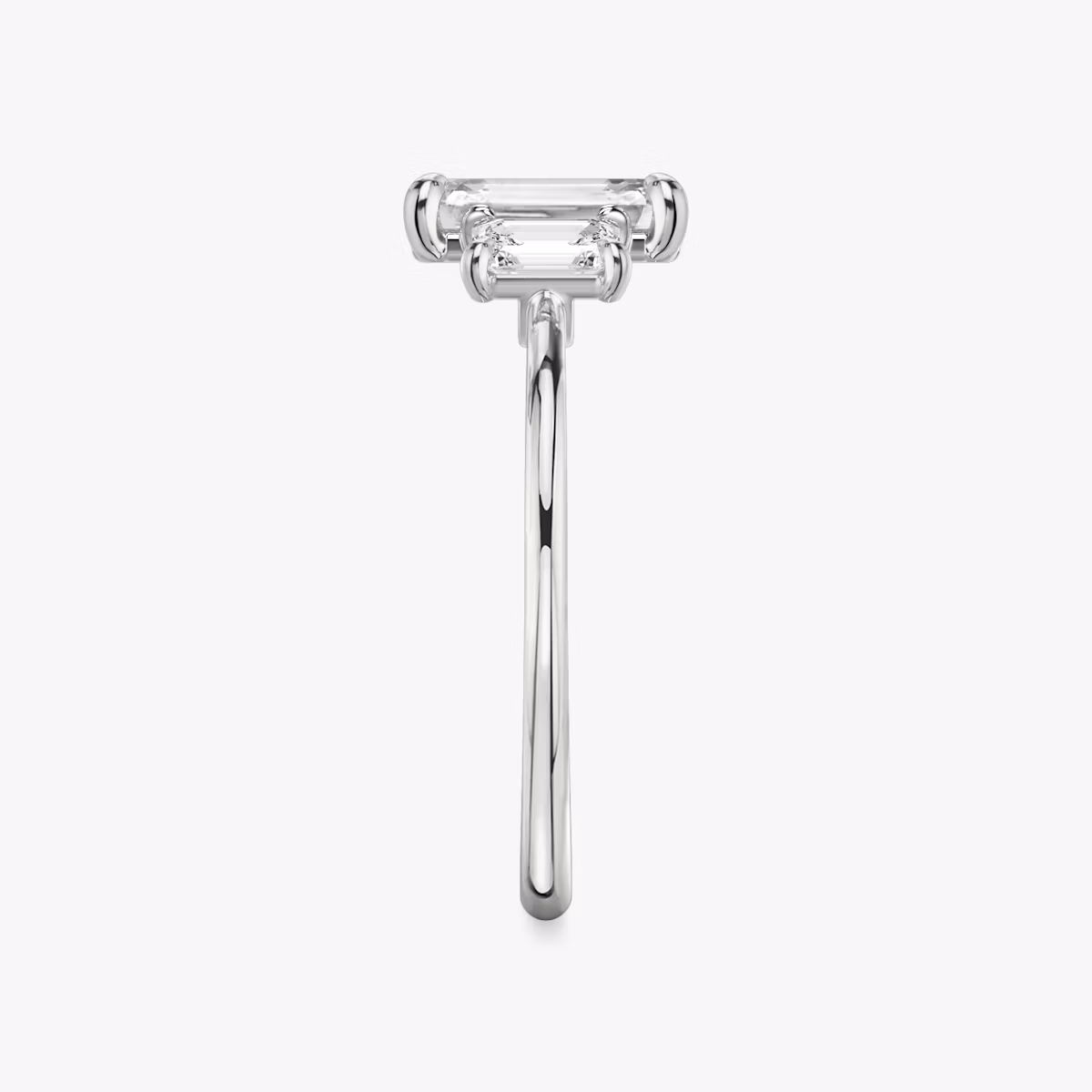 The Three Stone | Emerald | 18k | White Gold | bandAccent: Plain | sideStoneCarat: 0.25ct | sideStoneShape: Emerald | diamondOrientation: vertical | caratWeight: other
