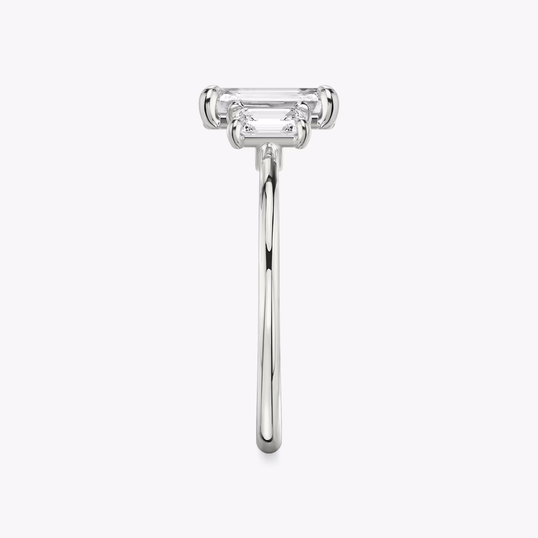 The Three Stone | Emerald | 18k | White Gold | bandAccent: Plain | sideStoneCarat: 0.25ct | sideStoneShape: Emerald | diamondOrientation: vertical | caratWeight: other