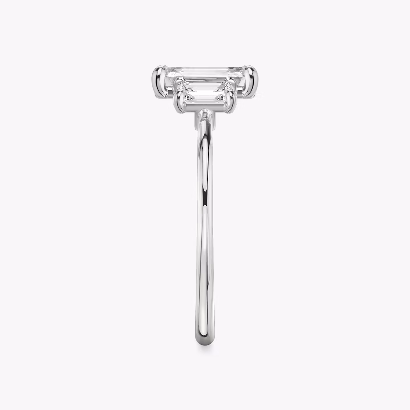 The Three Stone | Emerald | 18k | White Gold | bandAccent: Plain | sideStoneCarat: 0.25ct | sideStoneShape: Emerald | diamondOrientation: vertical | caratWeight: other