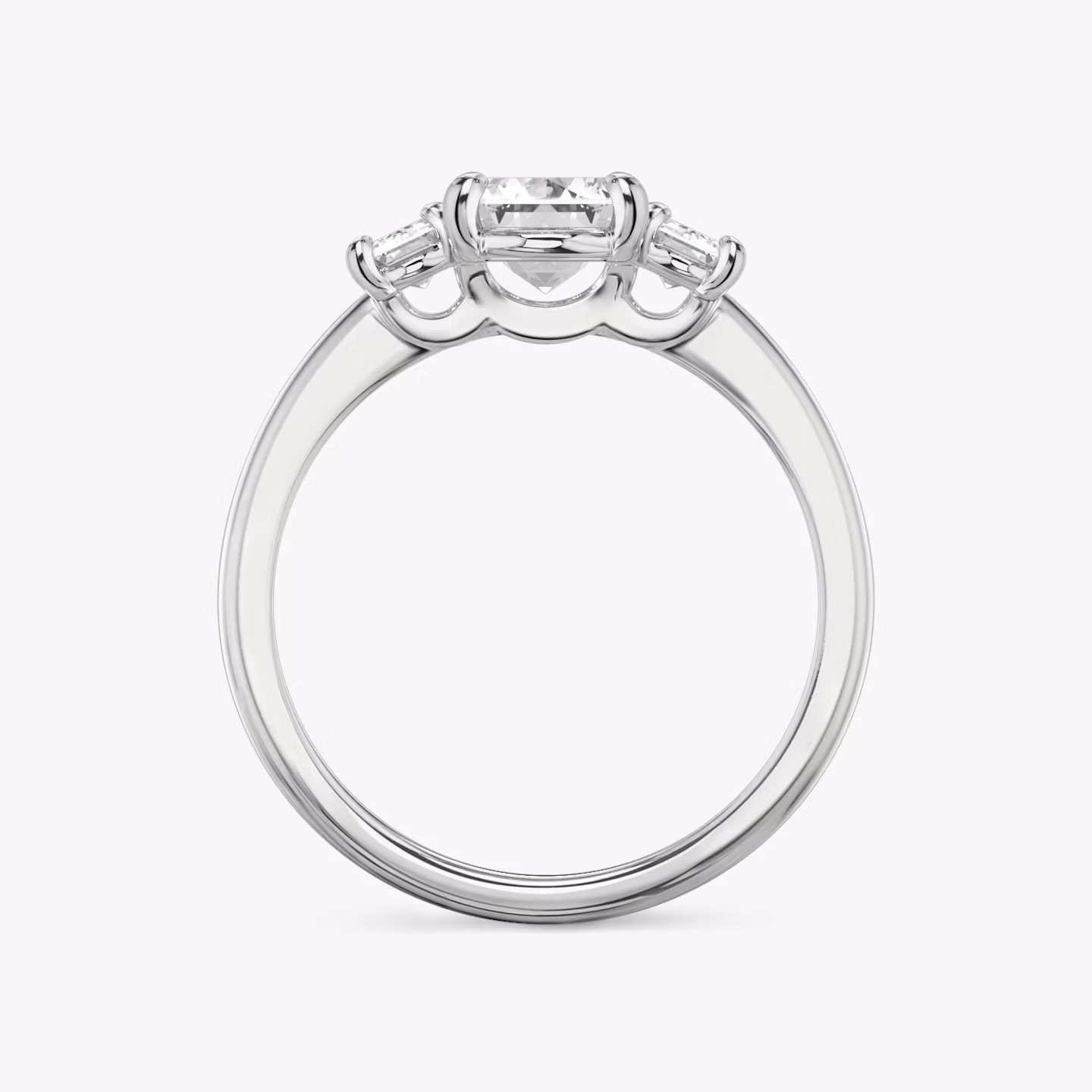 The Three Stone | Emerald | 18k | White Gold | bandAccent: Plain | sideStoneCarat: 0.25ct | sideStoneShape: Emerald | diamondOrientation: vertical | caratWeight: other