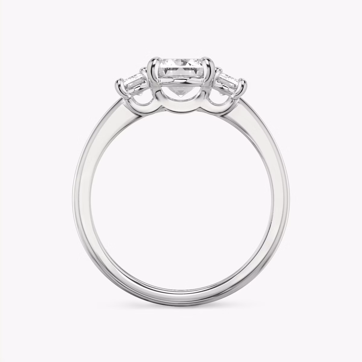 The Three Stone | Emerald | Platinum | bandAccent: Plain | sideStoneCarat: 0.25ct | sideStoneShape: Emerald | diamondOrientation: vertical | caratWeight: other