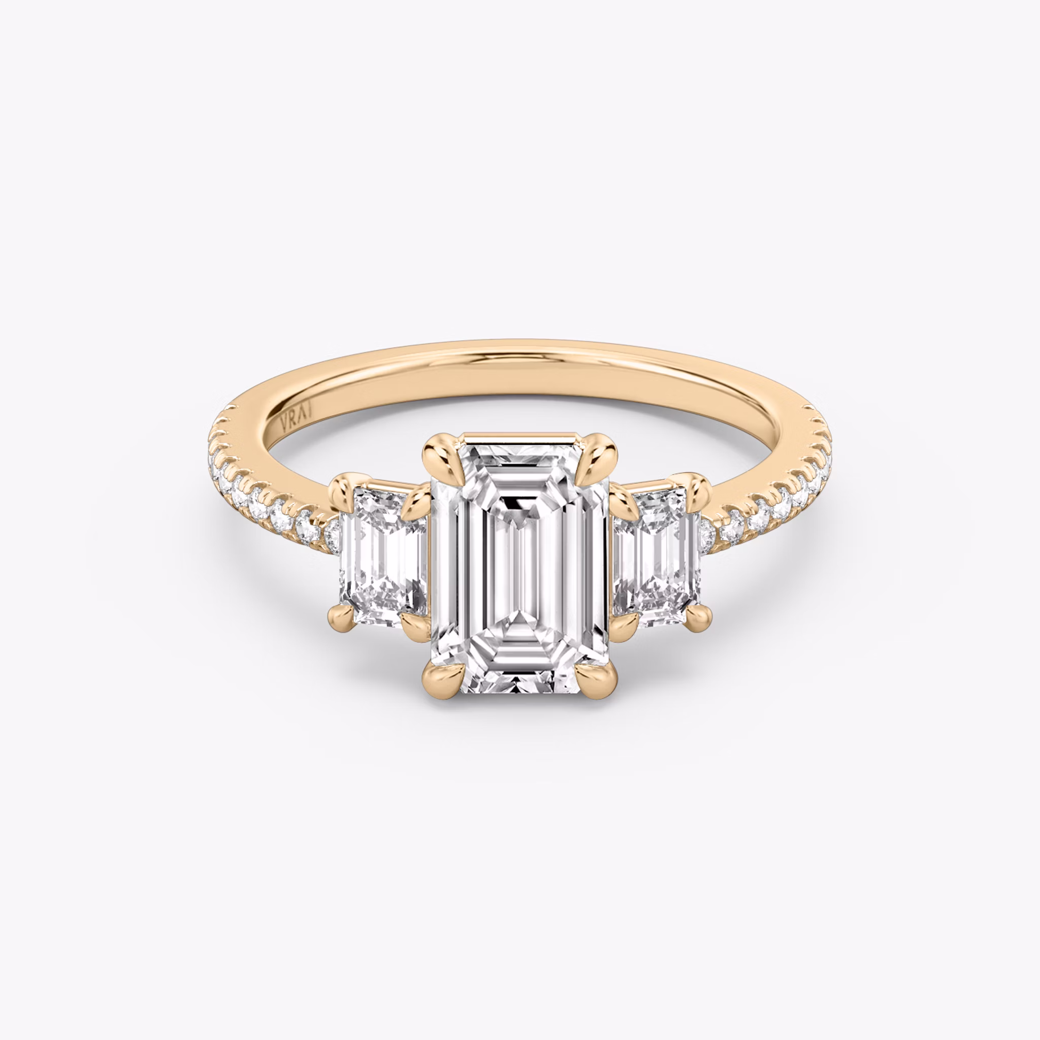The Three Stone | Emerald | 14k | Rose Gold | bandAccent: Pavé | sideStoneCarat: 0.25ct | sideStoneShape: Emerald | diamondOrientation: vertical | caratWeight: other