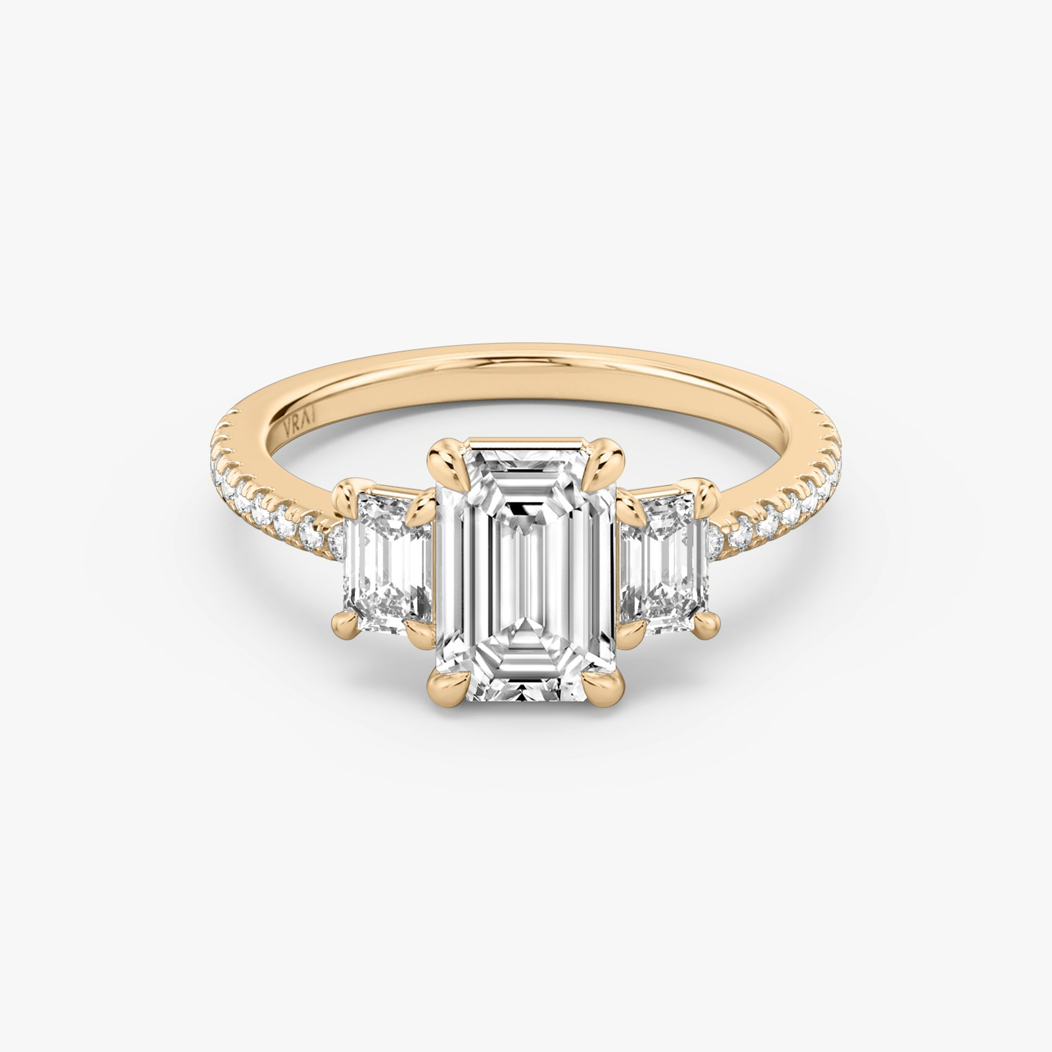 The Three Stone | Emerald | 14k | Rose Gold | bandAccent: Pavé | sideStoneCarat: 0.25ct | sideStoneShape: Emerald | diamondOrientation: vertical | caratWeight: other