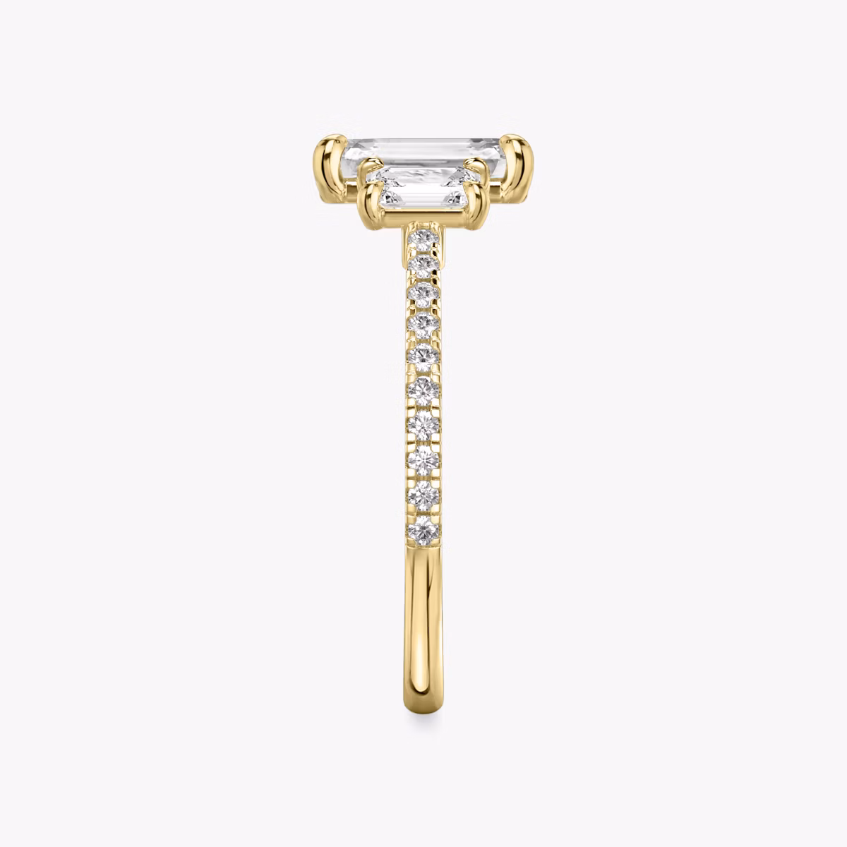 The Three Stone | Emerald | 18k | Yellow Gold | bandAccent: Pavé | sideStoneCarat: 0.25ct | sideStoneShape: Emerald | diamondOrientation: vertical | caratWeight: other