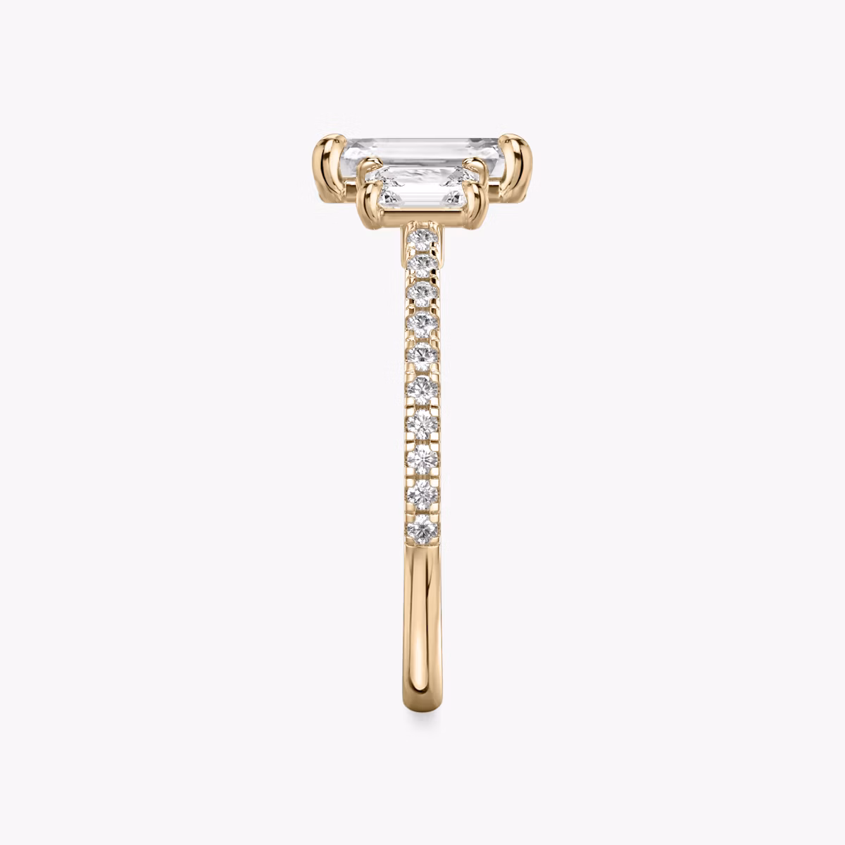 The Three Stone | Emerald | 14k | Rose Gold | bandAccent: Pavé | sideStoneCarat: 0.25ct | sideStoneShape: Emerald | diamondOrientation: vertical | caratWeight: other
