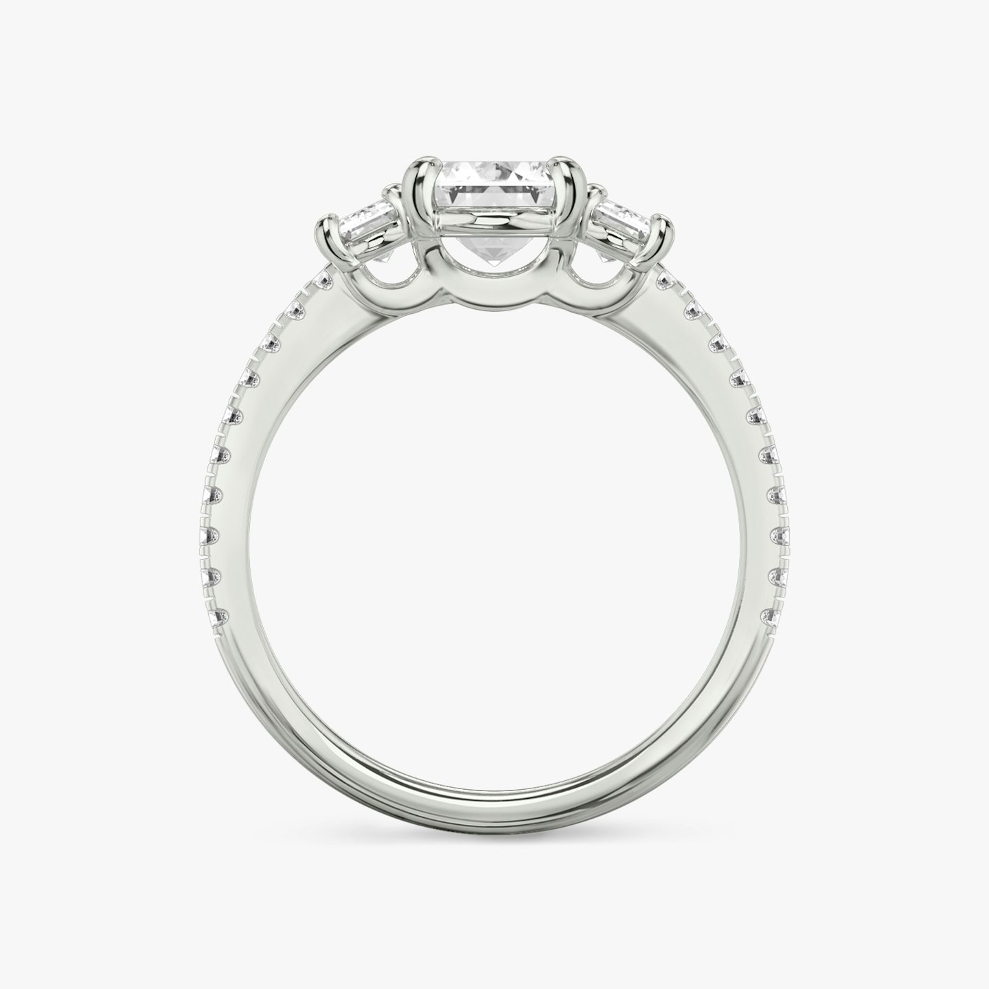 The Three Stone | Emerald | Platinum | bandAccent: Pavé | sideStoneCarat: 0.25ct | sideStoneShape: Emerald | diamondOrientation: vertical | caratWeight: other