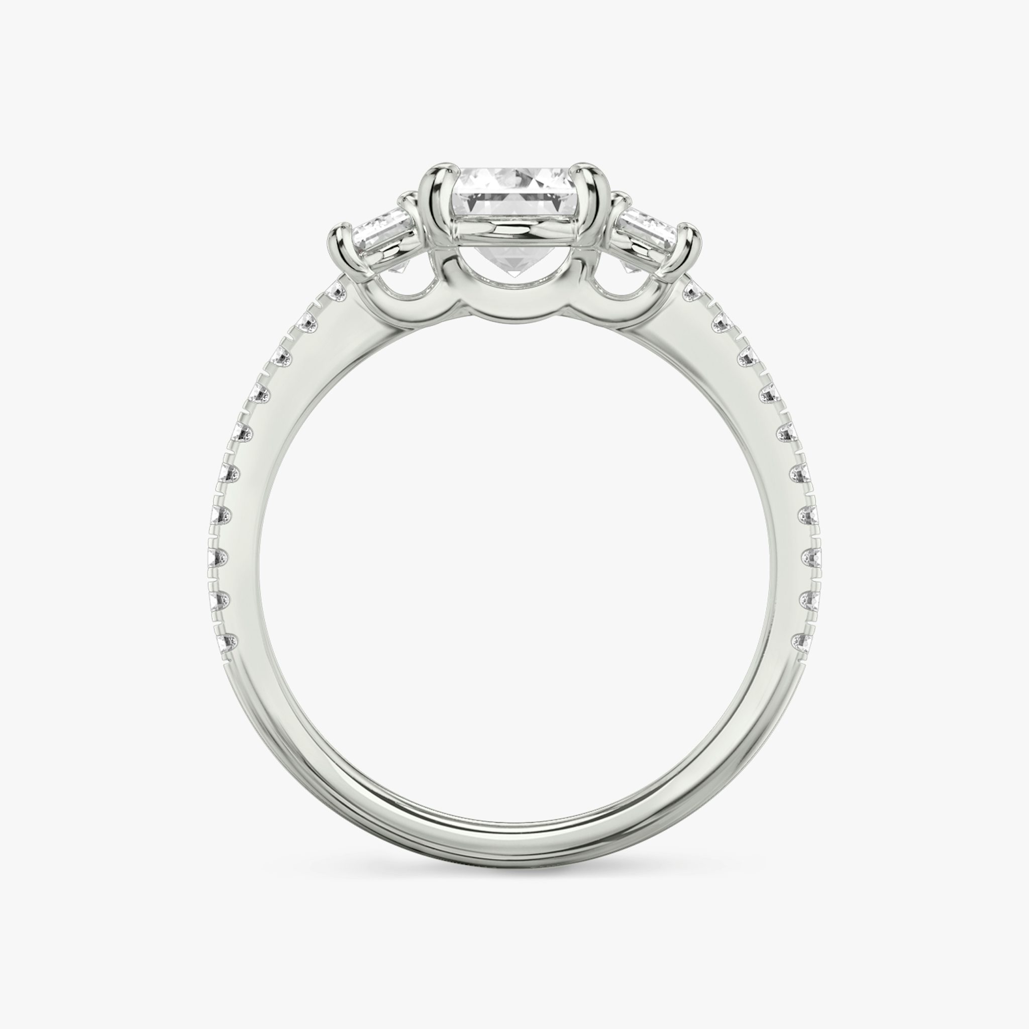 The Three Stone | Emerald | Platinum | bandAccent: Pavé | sideStoneCarat: 0.25ct | sideStoneShape: Emerald | diamondOrientation: vertical | caratWeight: other