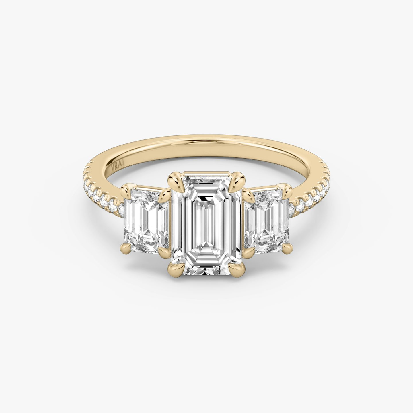 The Three Stone | Emerald | 14k | Rose Gold | bandAccent: Pavé | sideStoneCarat: 0.50ct | sideStoneShape: Emerald | diamondOrientation: vertical | caratWeight: other