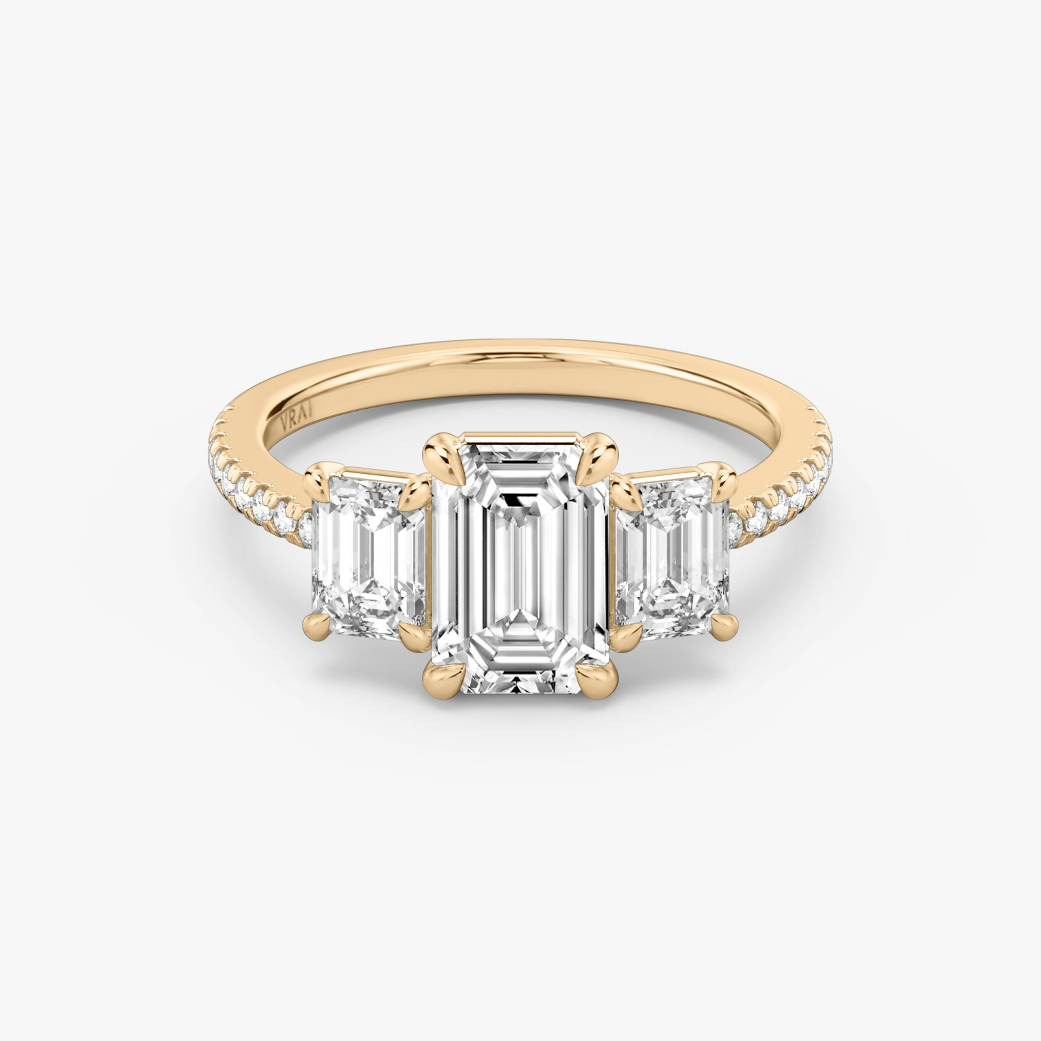 The Three Stone | Emerald | 14k | Rose Gold | bandAccent: Pavé | sideStoneCarat: 0.50ct | sideStoneShape: Emerald | diamondOrientation: vertical | caratWeight: other