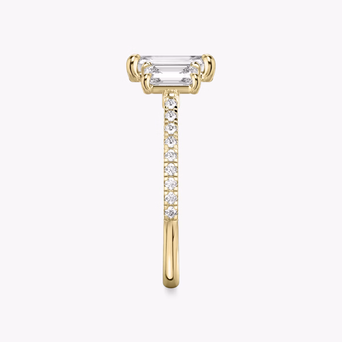 Three Stone | Emerald | 18k | Gelbgold | bandAccent: Mit Pavé-Besatz | sideStoneCarat: 0.50ct | sideStoneShape: Emerald | diamondOrientation: vertical | caratWeight: other