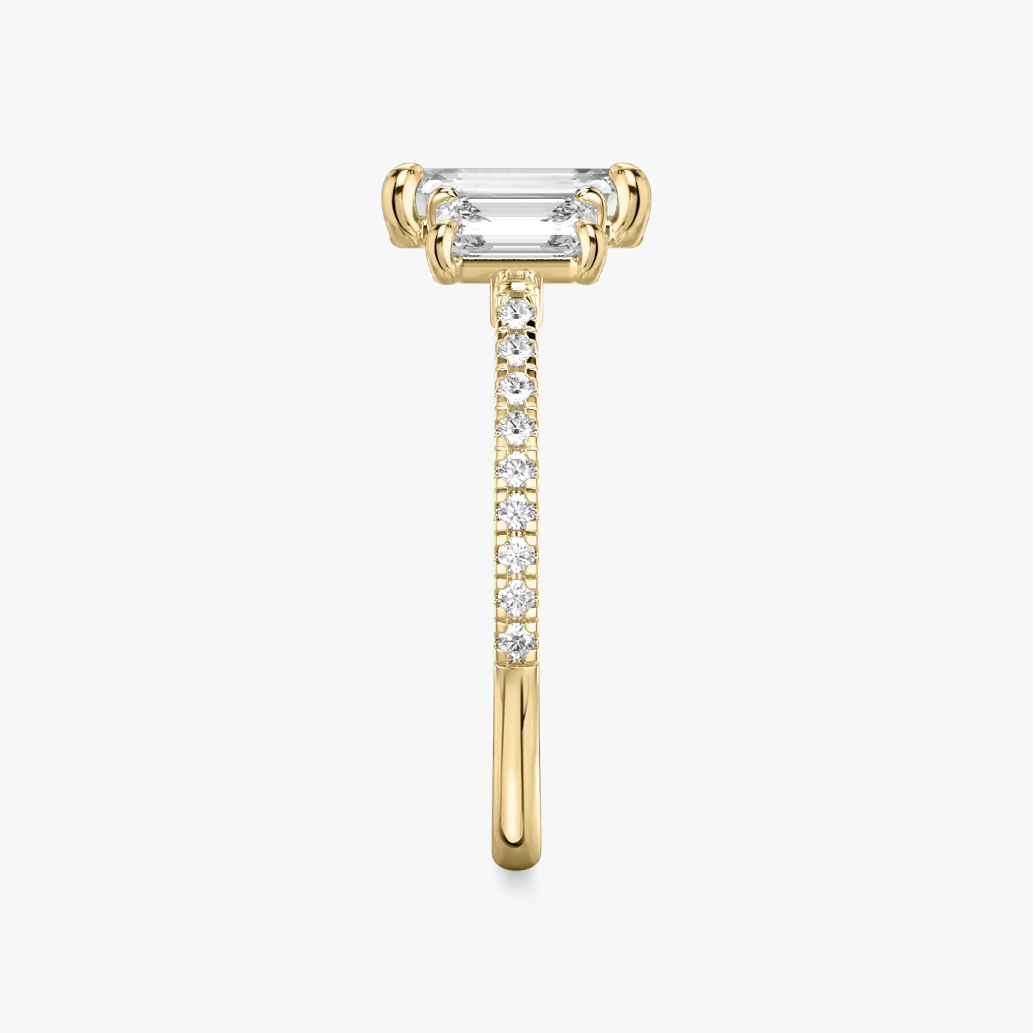 The Three Stone | Emerald | 18k | Yellow Gold | bandAccent: Pavé | sideStoneCarat: 0.50ct | sideStoneShape: Emerald | diamondOrientation: vertical | caratWeight: other