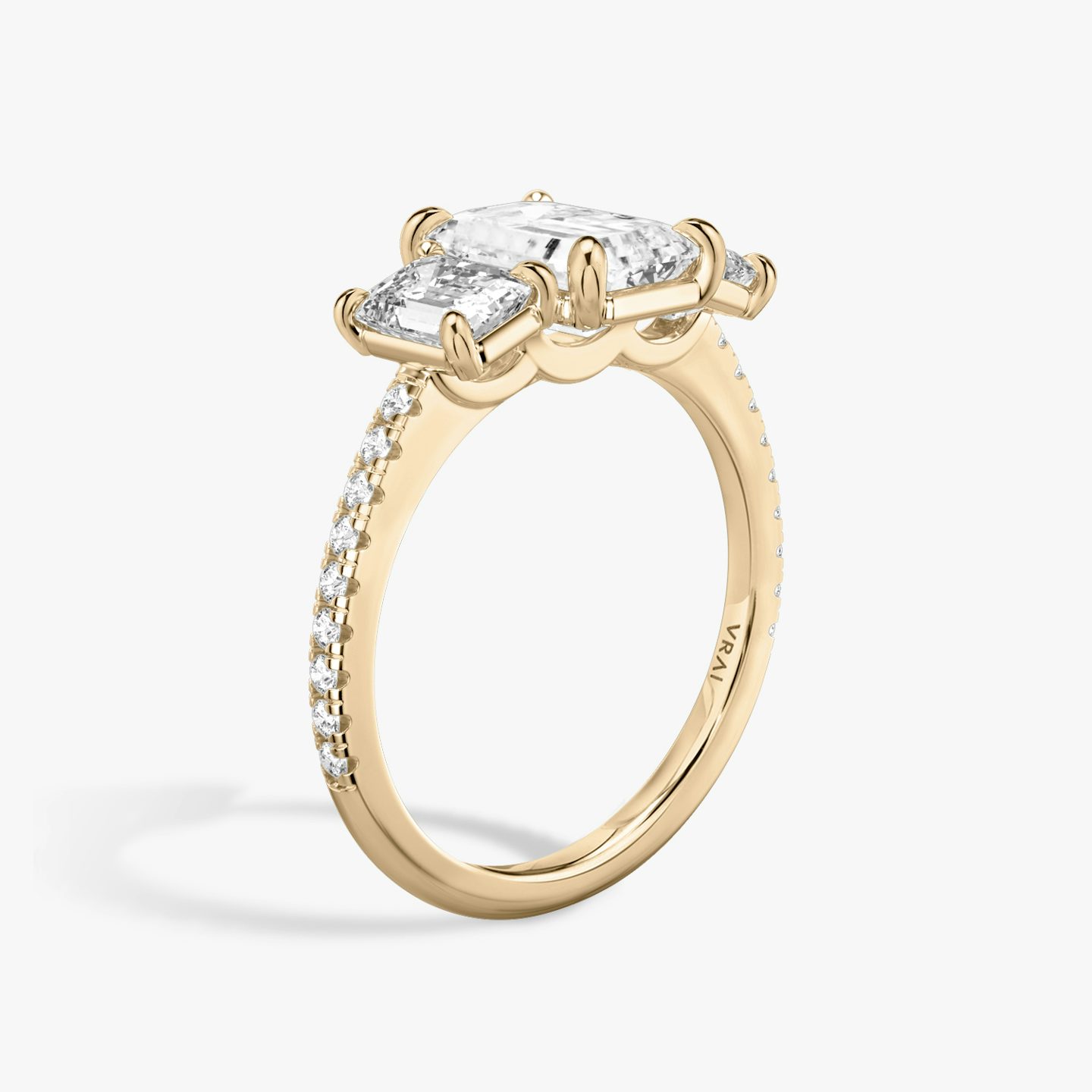 The Three Stone | Emerald | 14k | Rose Gold | bandAccent: Pavé | sideStoneCarat: 0.50ct | sideStoneShape: Emerald | diamondOrientation: vertical | caratWeight: other