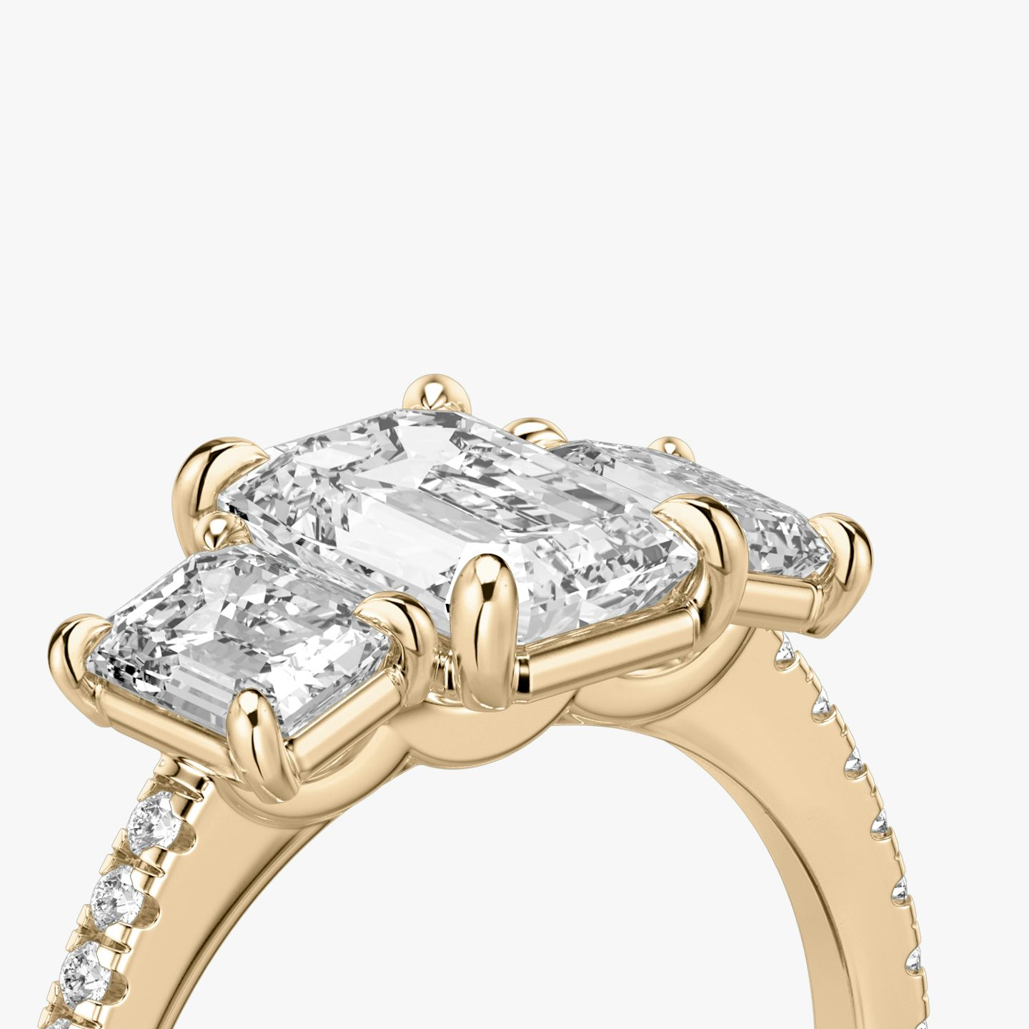 The Three Stone | Emerald | 14k | Rose Gold | bandAccent: Pavé | sideStoneCarat: 0.50ct | sideStoneShape: Emerald | diamondOrientation: vertical | caratWeight: other