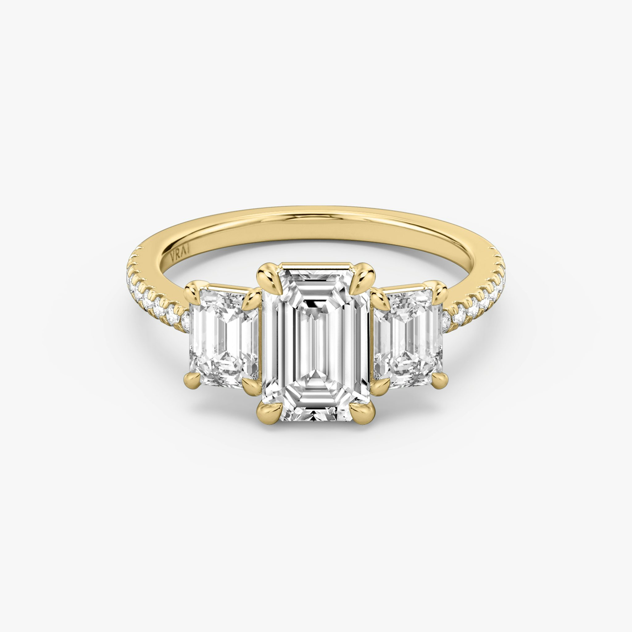 The Three Stone | Emerald | 18k | Yellow Gold | bandAccent: Pavé | sideStoneCarat: 0.50ct | sideStoneShape: Emerald | diamondOrientation: vertical | caratWeight: other