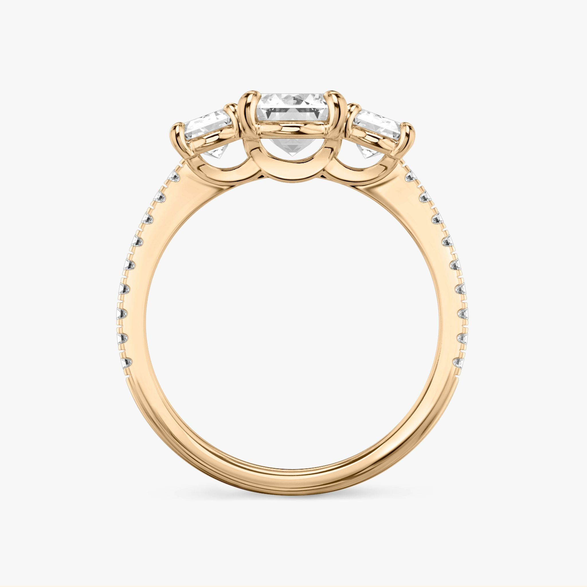 The Three Stone | Emerald | 14k | Rose Gold | bandAccent: Pavé | sideStoneCarat: 0.50ct | sideStoneShape: Emerald | diamondOrientation: vertical | caratWeight: other