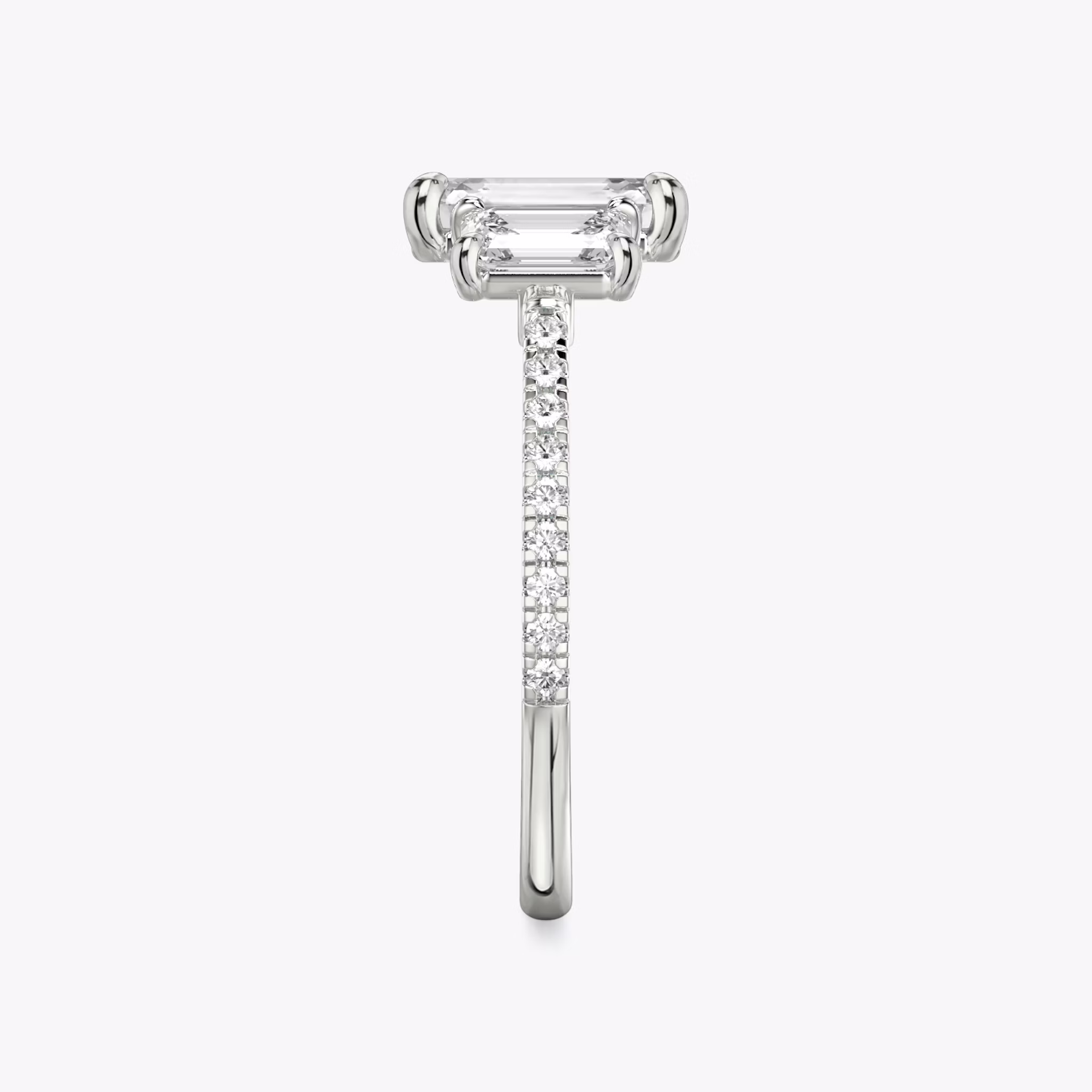 The Three Stone | Emerald | 18k | White Gold | bandAccent: Pavé | sideStoneCarat: 0.50ct | sideStoneShape: Emerald | diamondOrientation: vertical | caratWeight: other