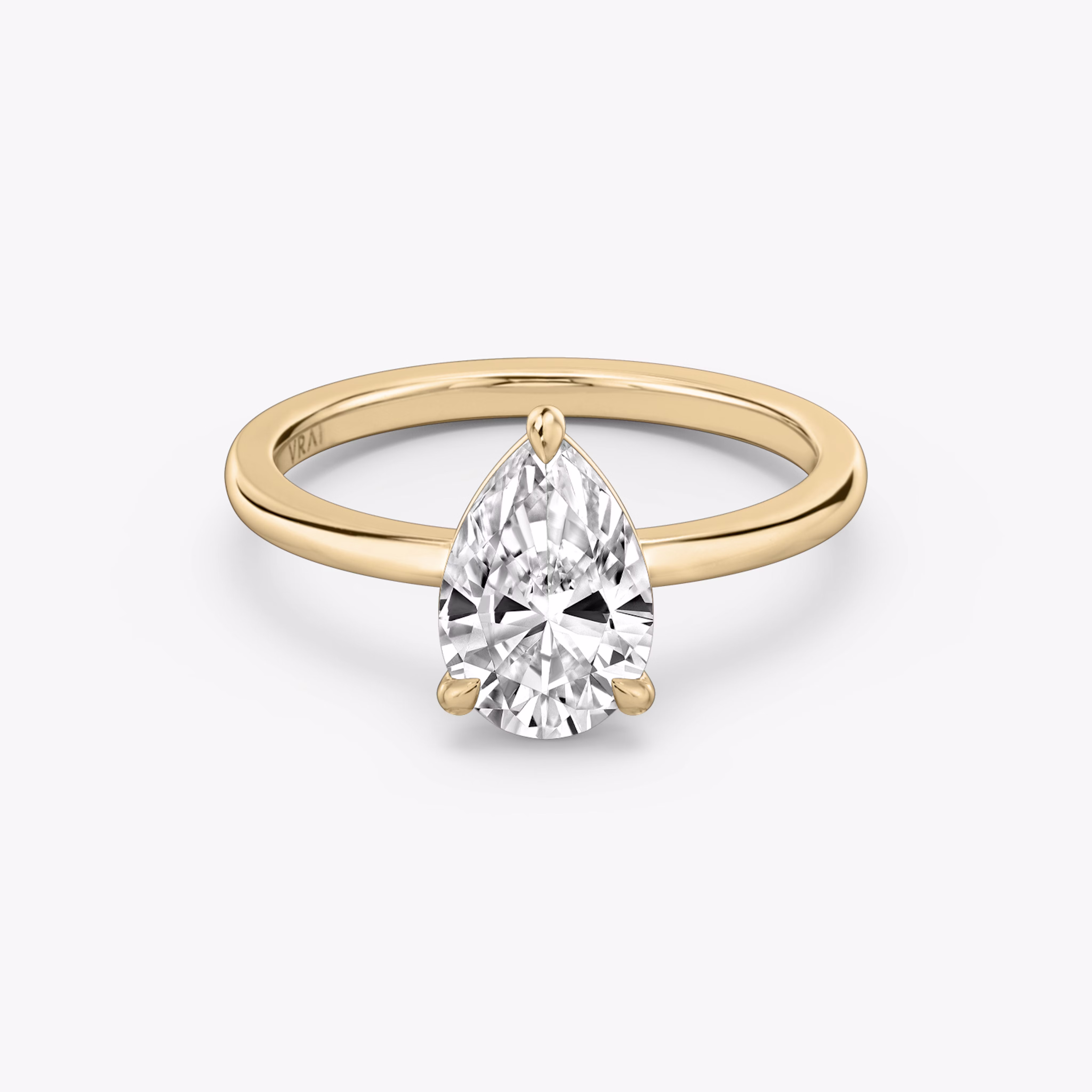 Pear signature prong ring
