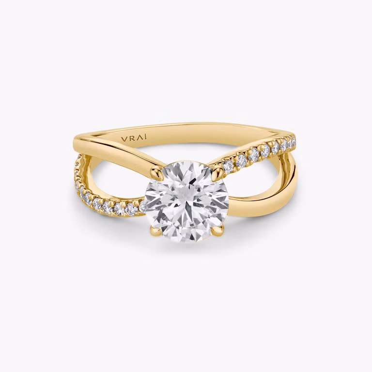 Yellow gold Duet ring with 1.00ct round brilliant-cut center diamond and pavé band, shown on white background.