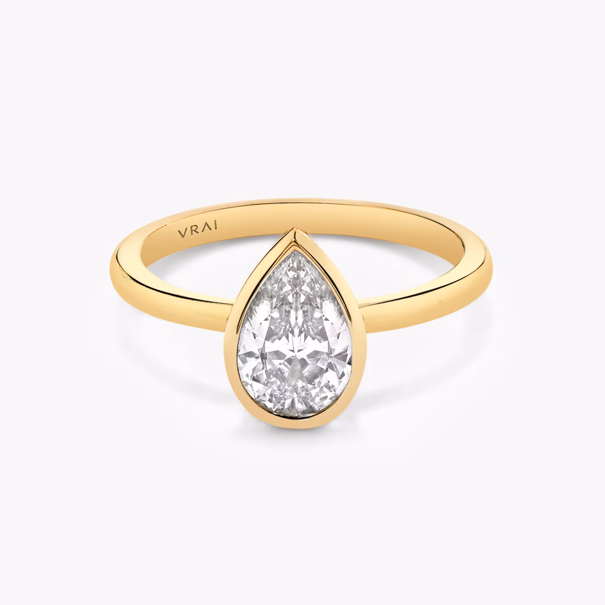 The Signature Bezel | Pear | 18k | Yellow Gold | bandAccent: Plain | diamondOrientation: vertical | caratWeight: other