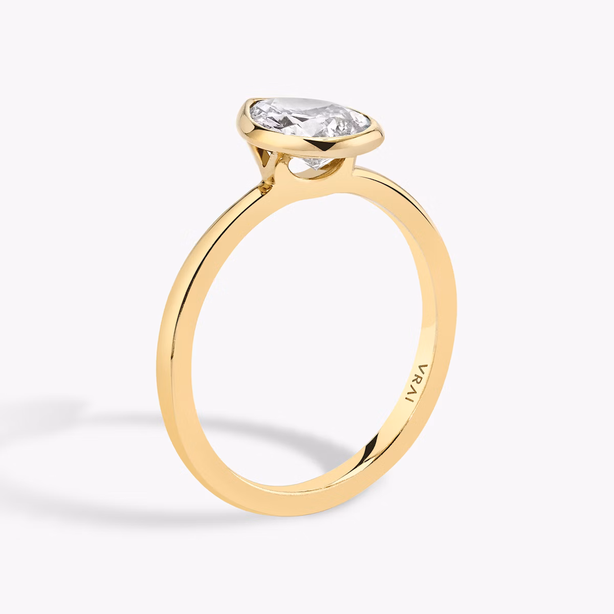 The Signature Bezel | Pear | 18k | Yellow Gold | bandAccent: Plain | diamondOrientation: vertical | caratWeight: other