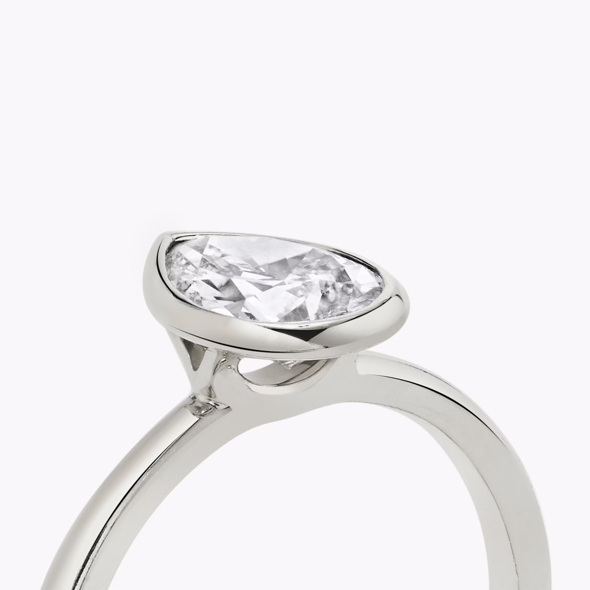 The Signature Bezel | Pear | 18k | White Gold | bandAccent: Plain | diamondOrientation: vertical | caratWeight: other
