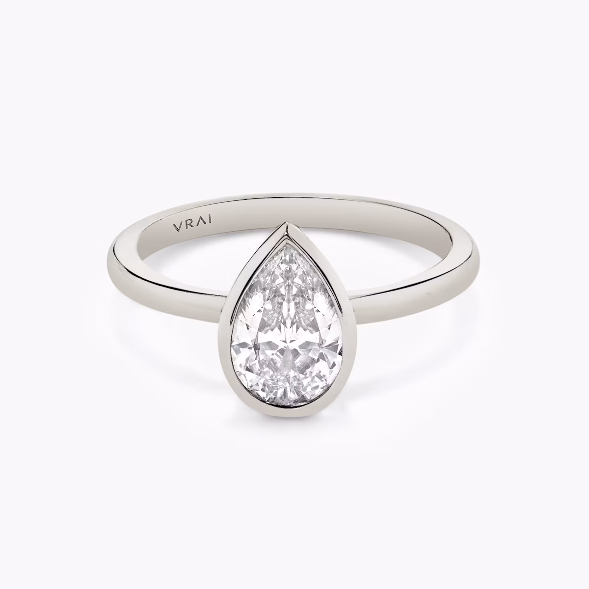 Signature bezel pear ring