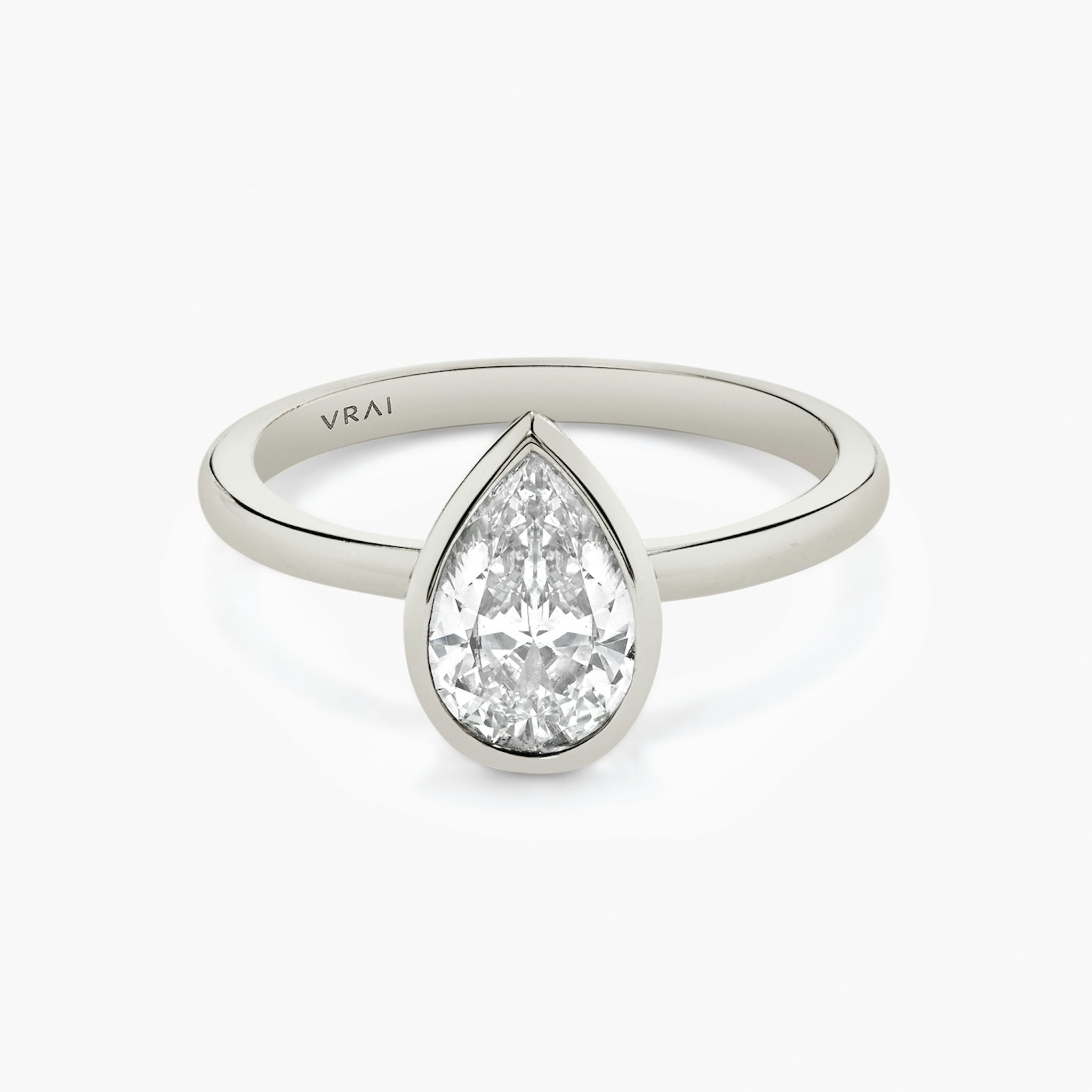 Signature bezel pear ring