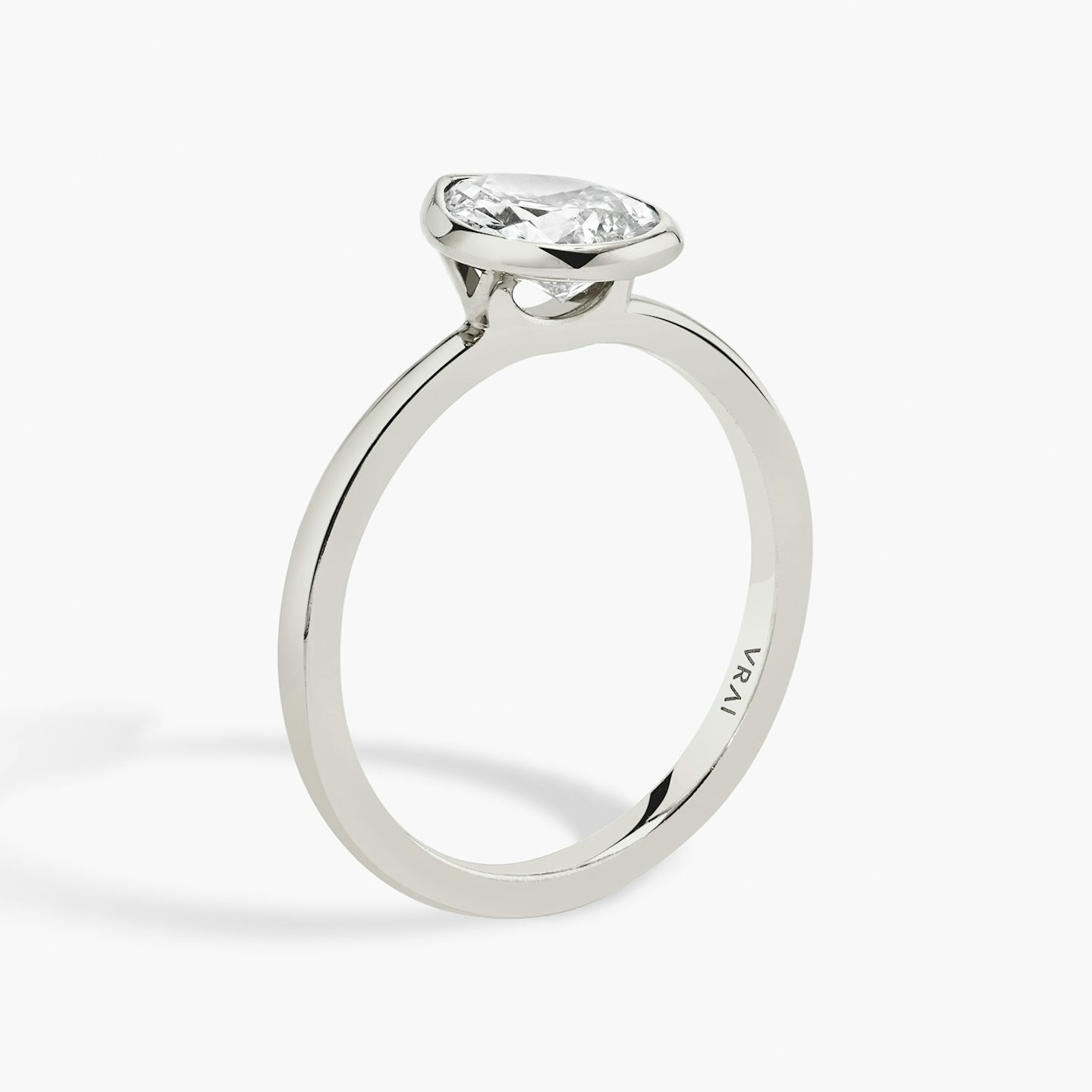 The Signature Bezel | Pear | Platinum | bandAccent: Plain | diamondOrientation: vertical | caratWeight: other