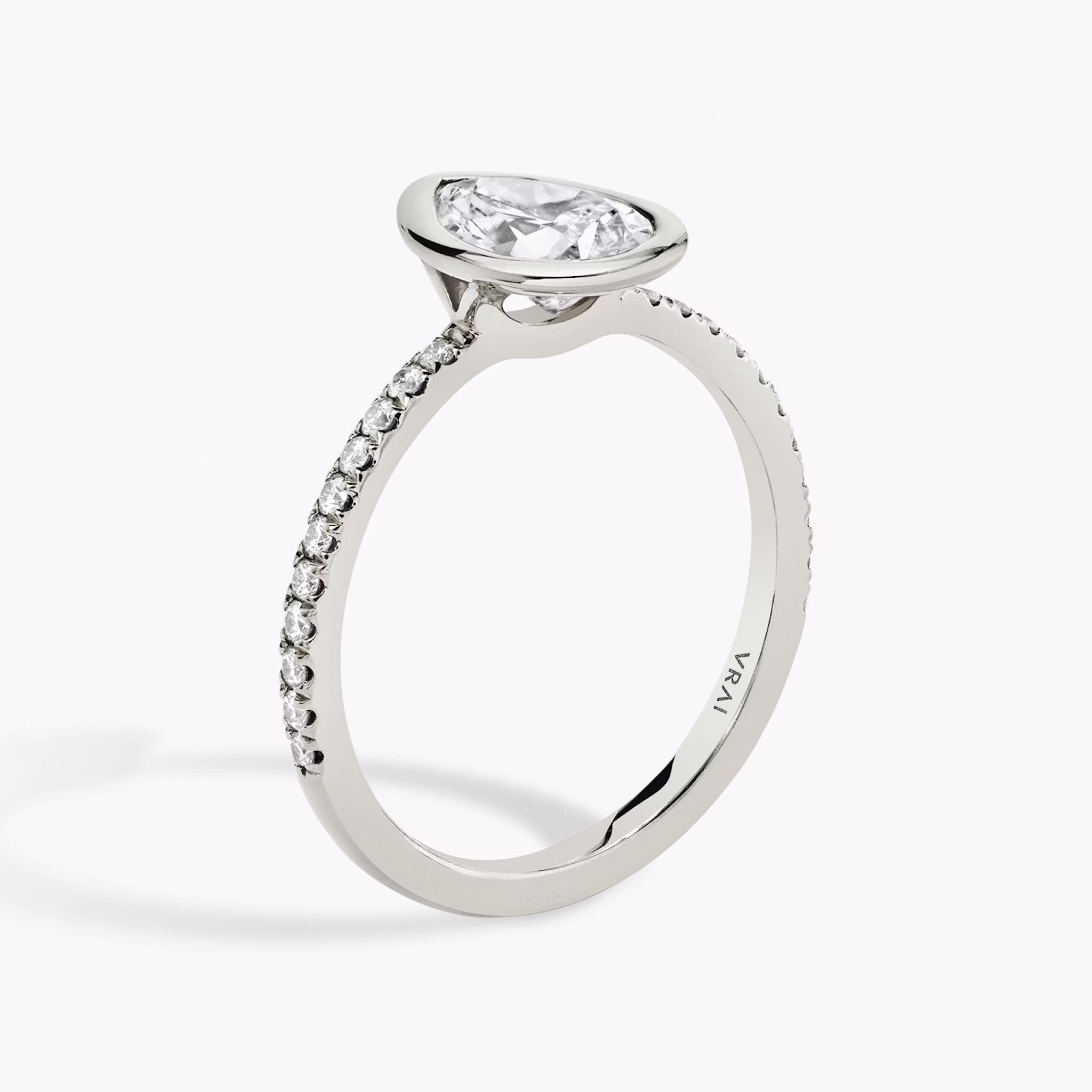 The Signature Bezel | Pear | 18k | White Gold | bandAccent: Pavé | diamondOrientation: vertical | caratWeight: other
