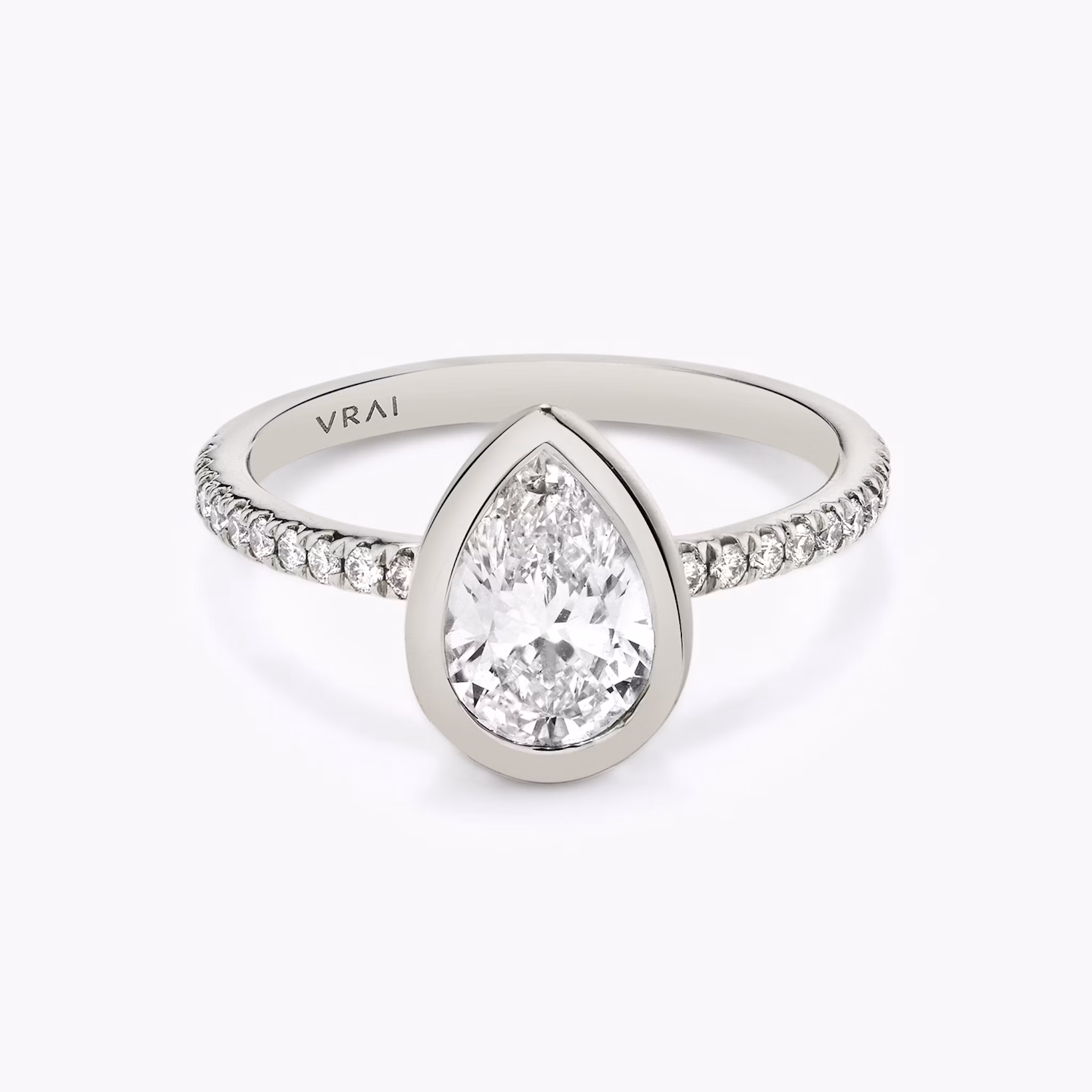 Platinum Signature Bezel engagement ring with Pear cut diamond