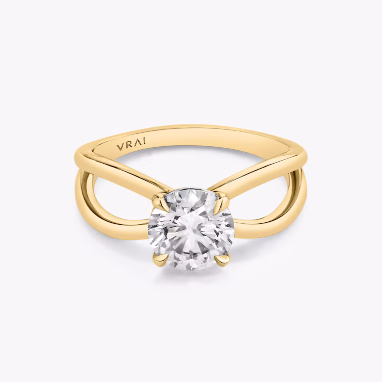 Front view of the Duet engagement ring in 18k yellow gold with a 1.5ct round brilliant VRAI created diamond
