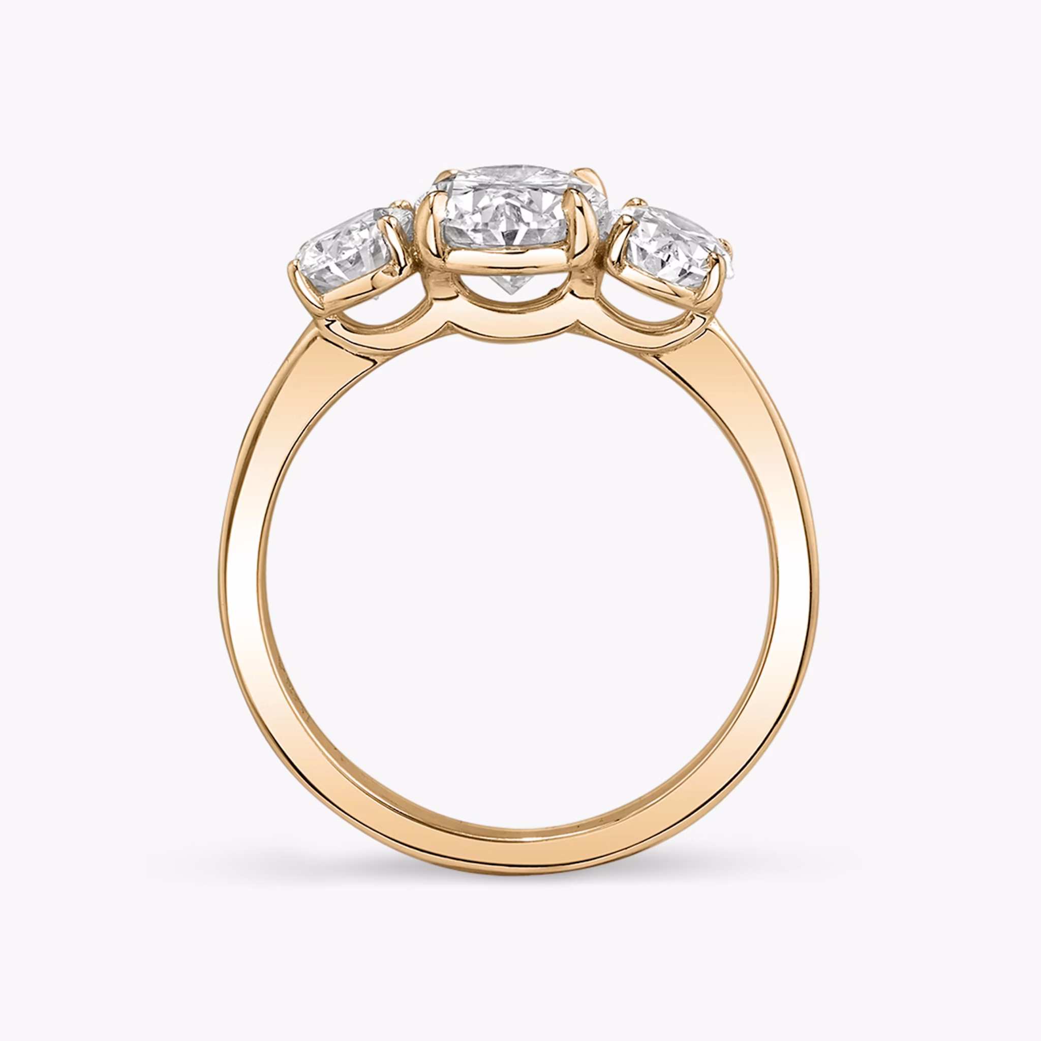 The Three Stone | Oval | 14k | Rose Gold | bandAccent: Plain | sideStoneCarat: 0.50ct | sideStoneShape: Oval | diamondOrientation: vertical | caratWeight: other
