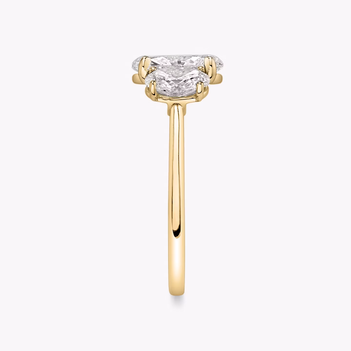The Three Stone | Oval | 18k | Yellow Gold | bandAccent: Plain | sideStoneCarat: 0.50ct | sideStoneShape: Oval | diamondOrientation: vertical | caratWeight: other