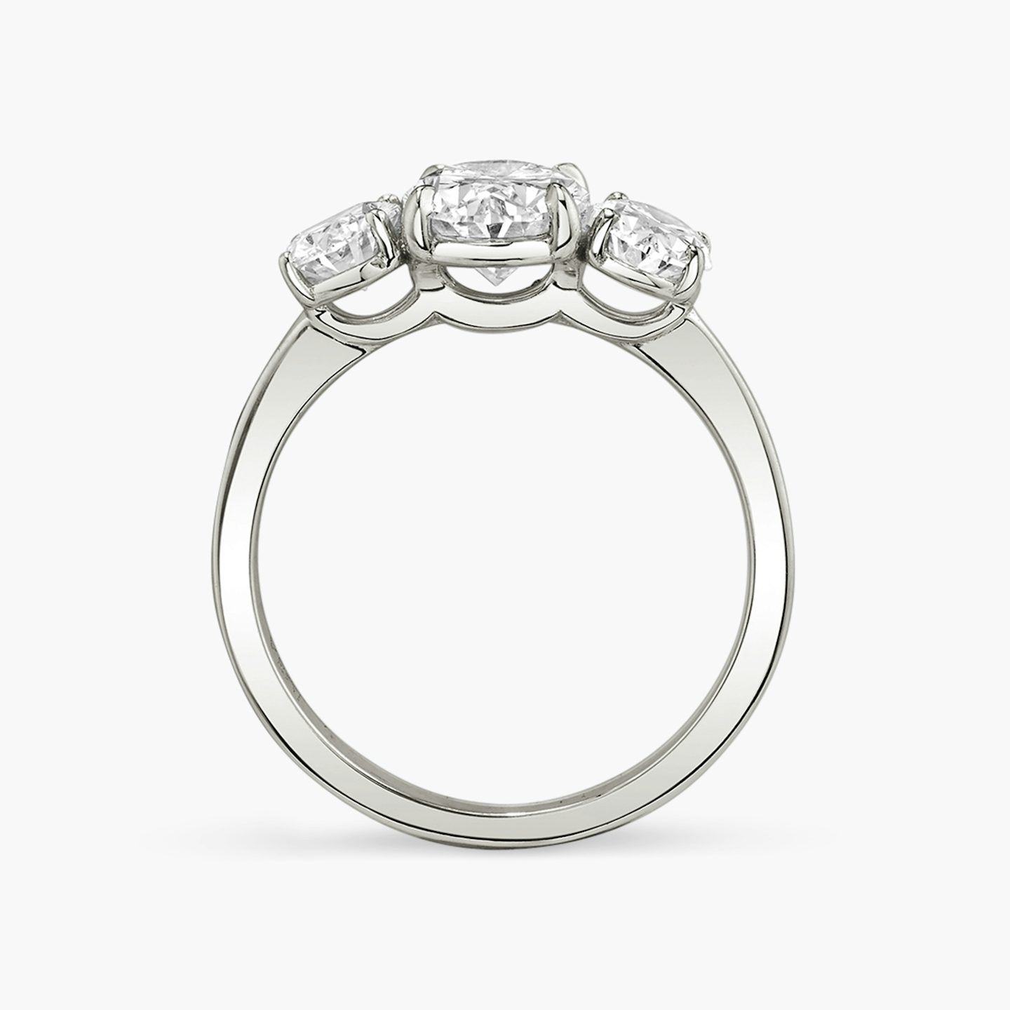The Three Stone | Oval | Platinum | bandAccent: Plain | sideStoneCarat: 0.50ct | sideStoneShape: Oval | diamondOrientation: vertical | caratWeight: other