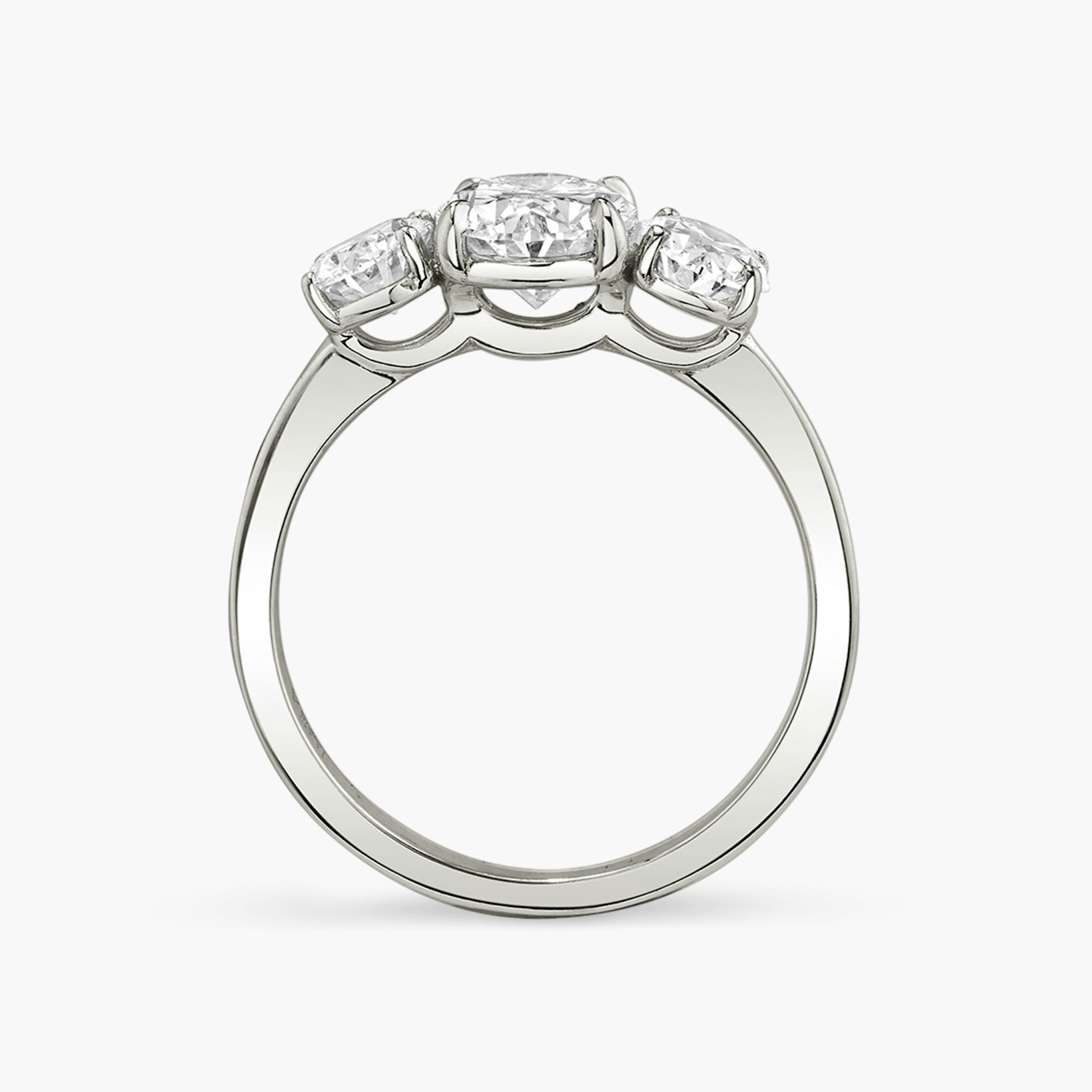 The Three Stone | Oval | Platinum | bandAccent: Plain | sideStoneCarat: 0.50ct | sideStoneShape: Oval | diamondOrientation: vertical | caratWeight: other