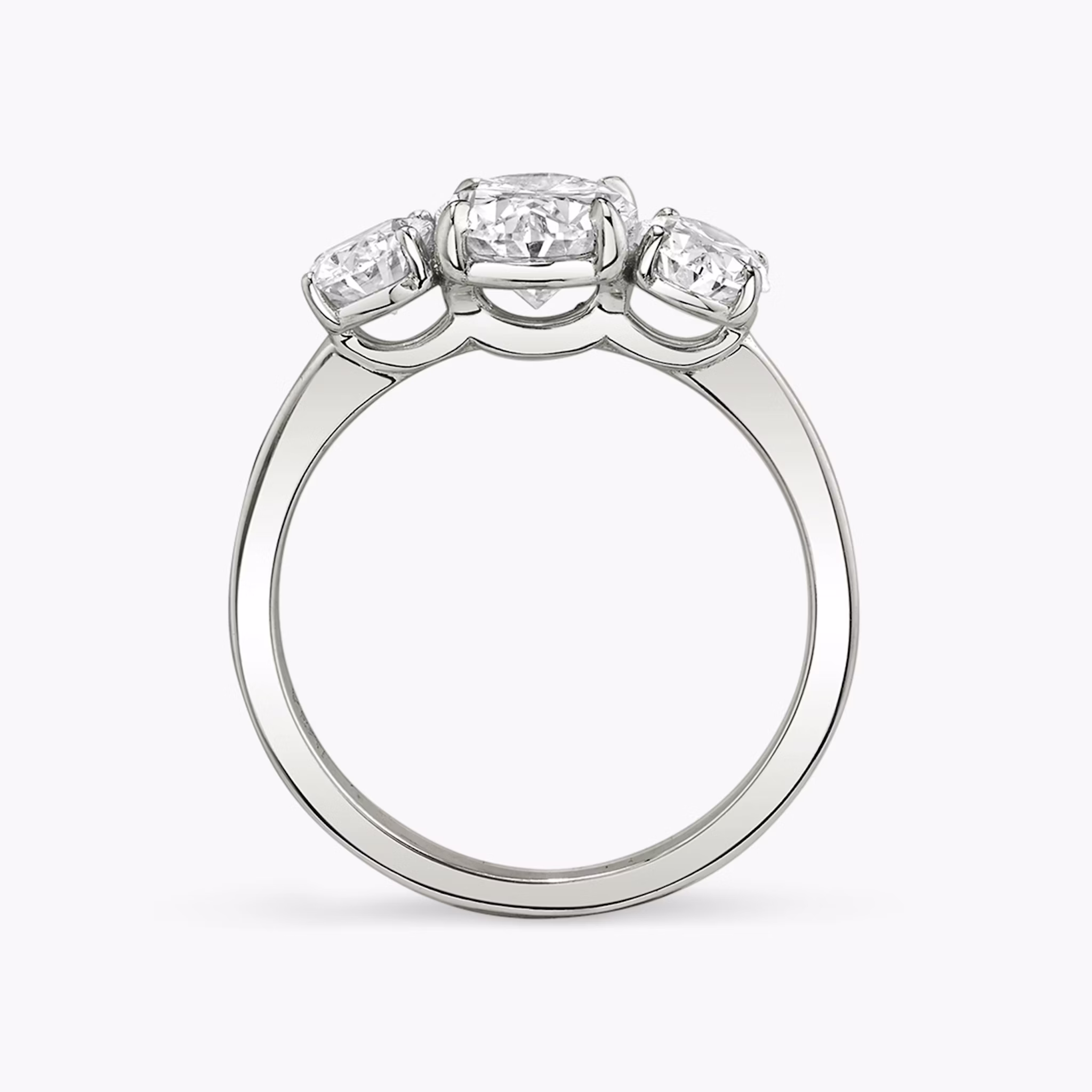 The Three Stone | Oval | 18k | White Gold | bandAccent: Plain | sideStoneCarat: 0.50ct | sideStoneShape: Oval | diamondOrientation: vertical | caratWeight: other