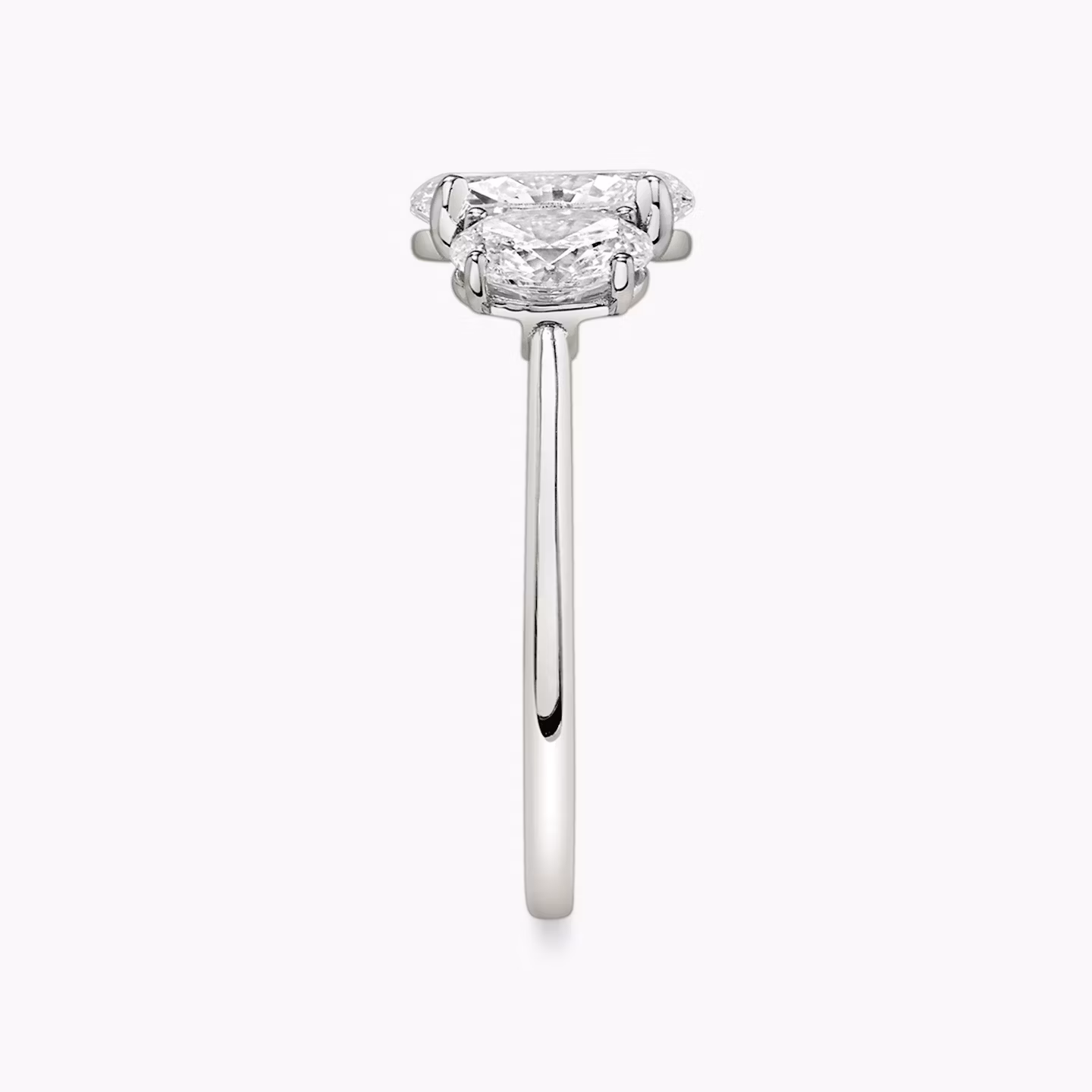 The Three Stone | Oval | 18k | White Gold | bandAccent: Plain | sideStoneCarat: 0.50ct | sideStoneShape: Oval | diamondOrientation: vertical | caratWeight: other