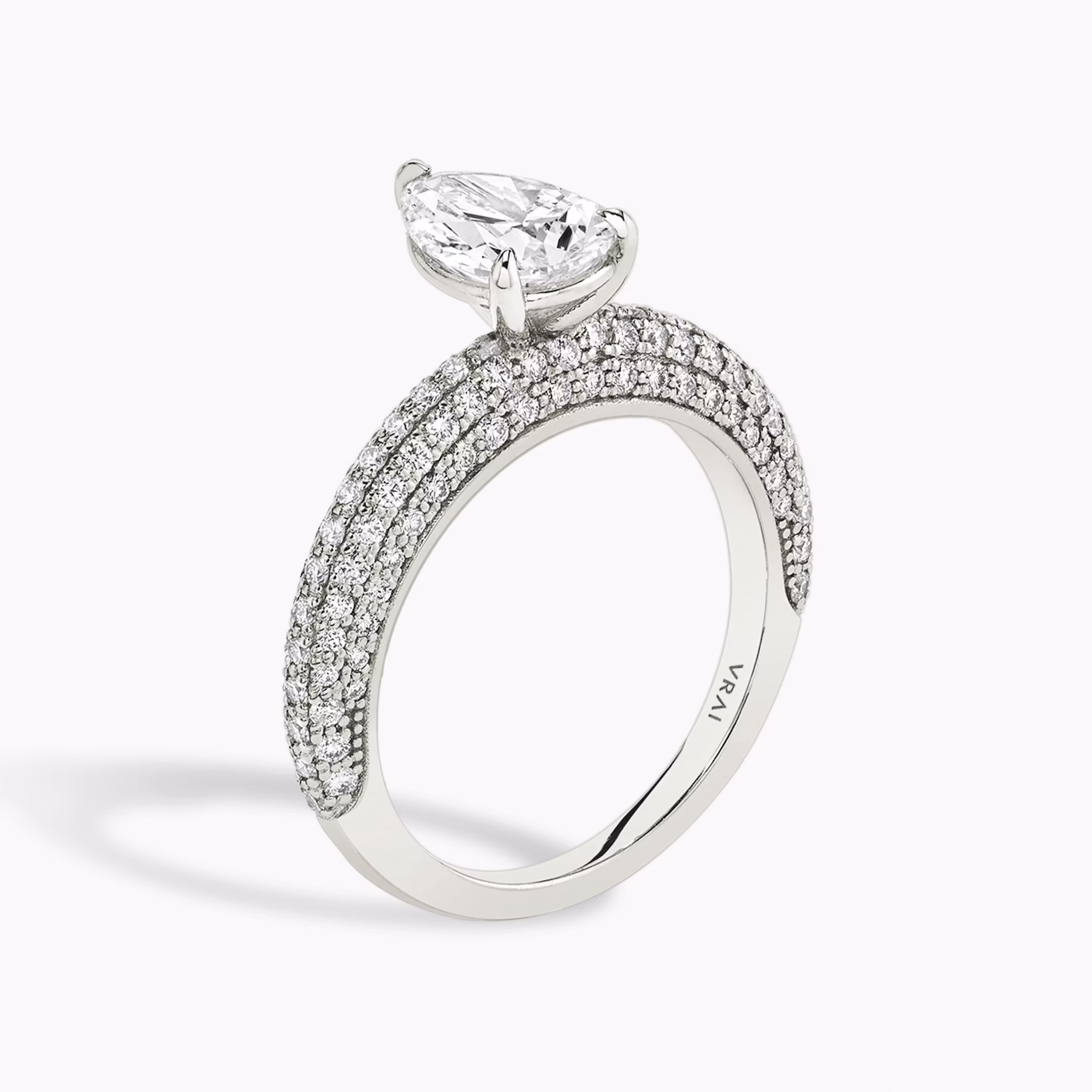 The Curator | Pear | Platinum | bandAccent: Pavé | diamondOrientation: vertical | caratWeight: other