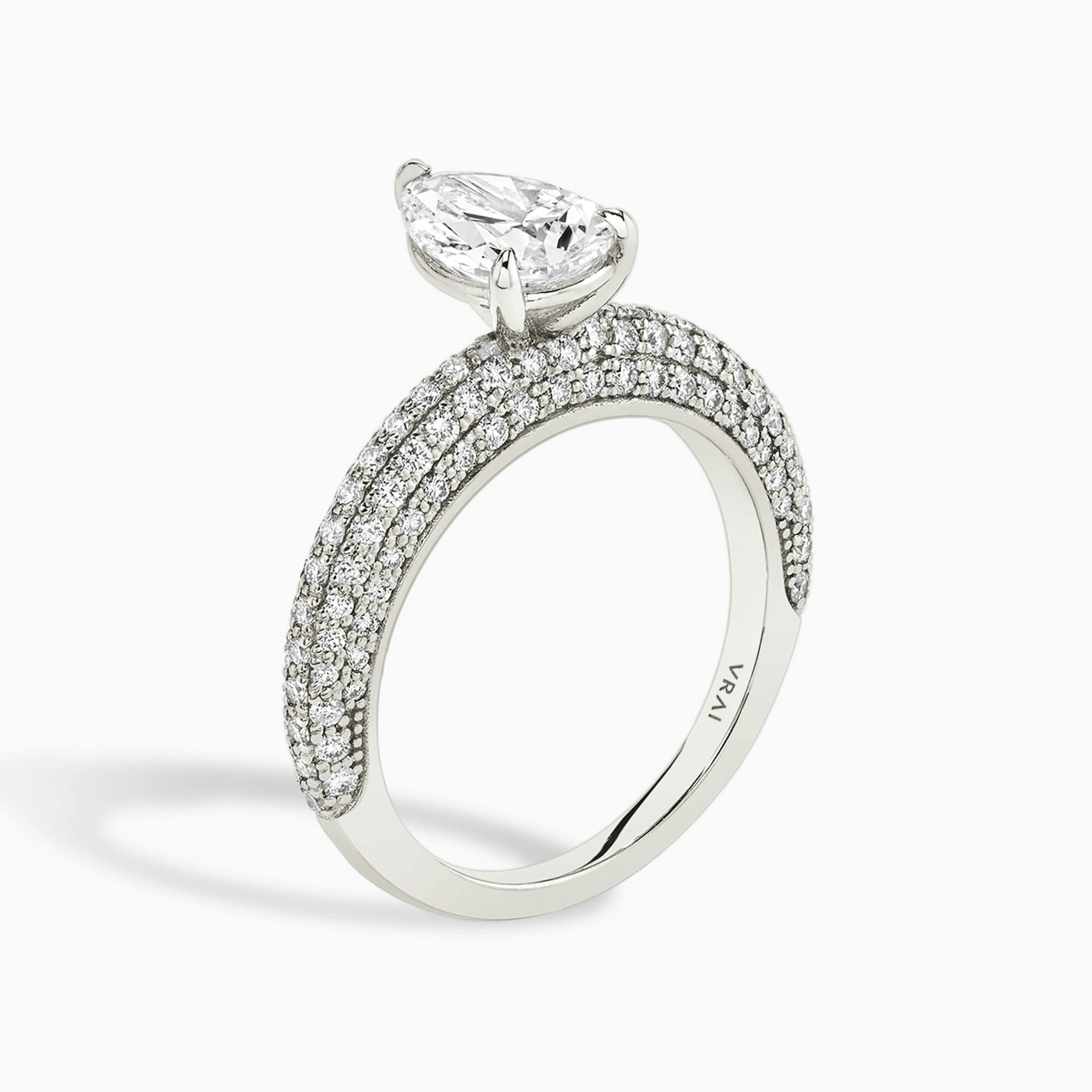 The Curator | Pear | Platinum | bandAccent: Pavé | diamondOrientation: vertical | caratWeight: other