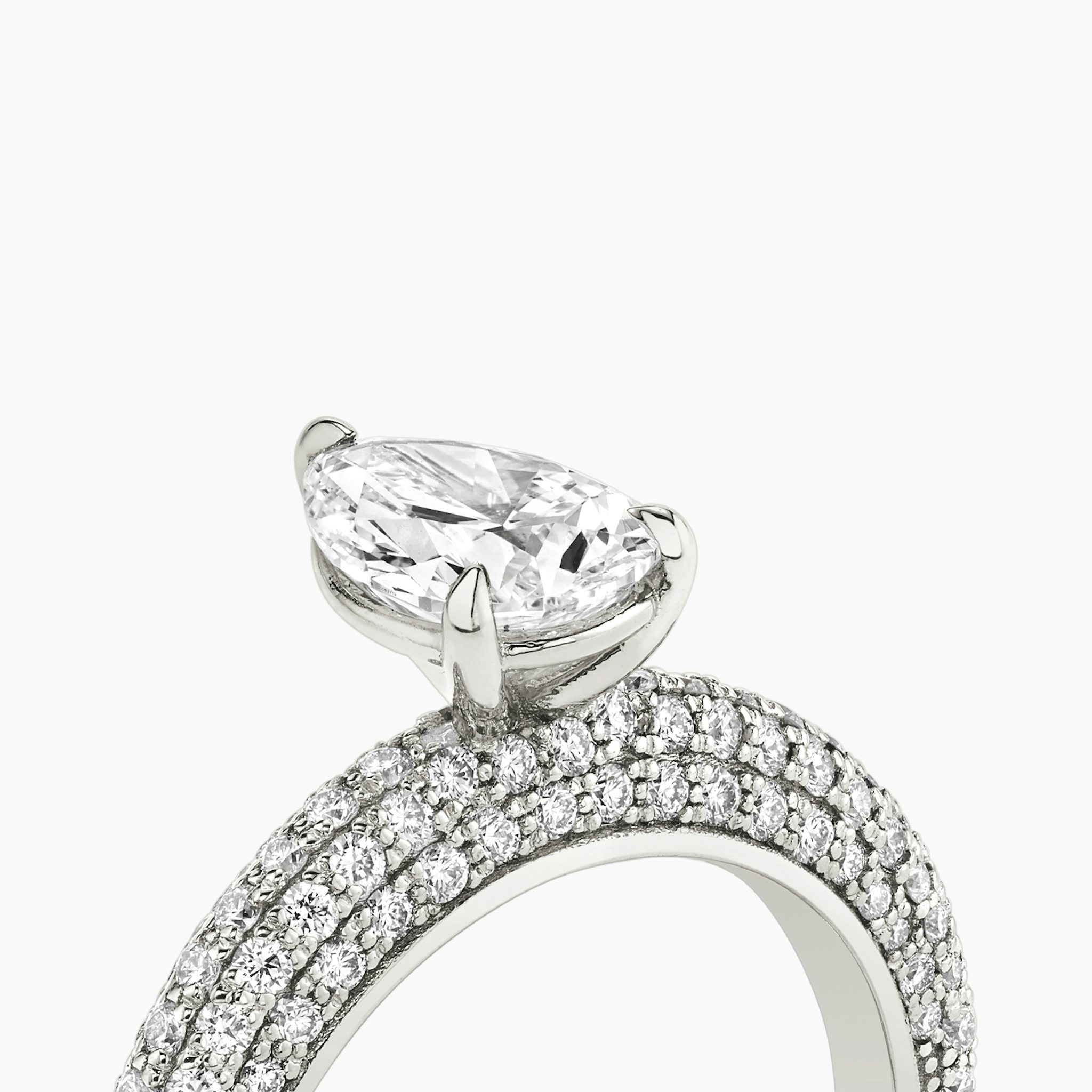The Curator | Pear | Platinum | bandAccent: Pavé | diamondOrientation: vertical | caratWeight: other
