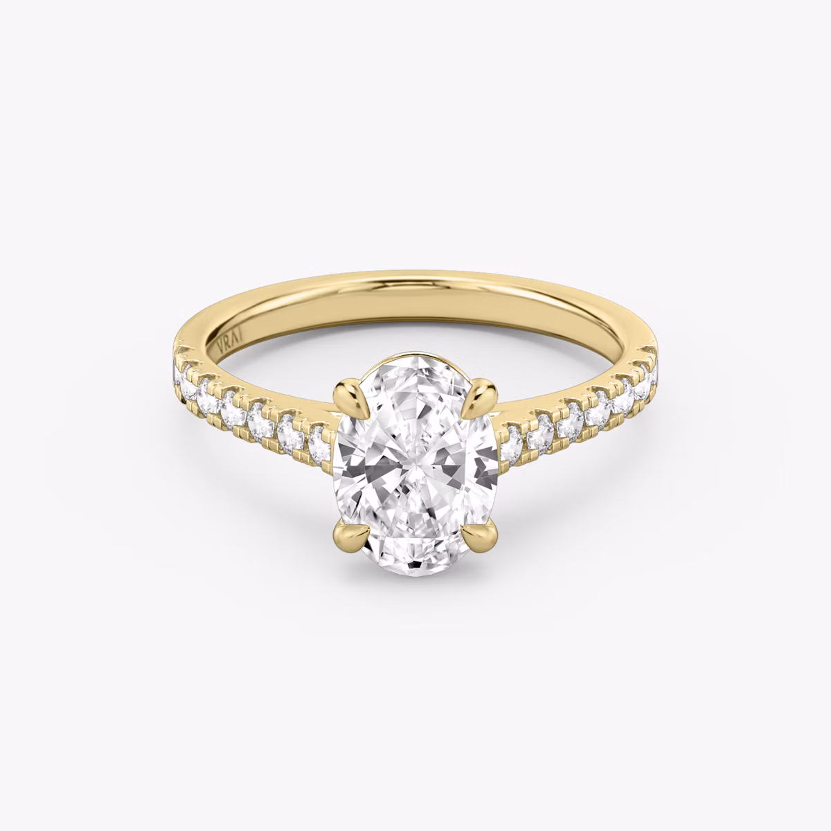Yellow gold Cathedral engagement ring with Oval cut diamond