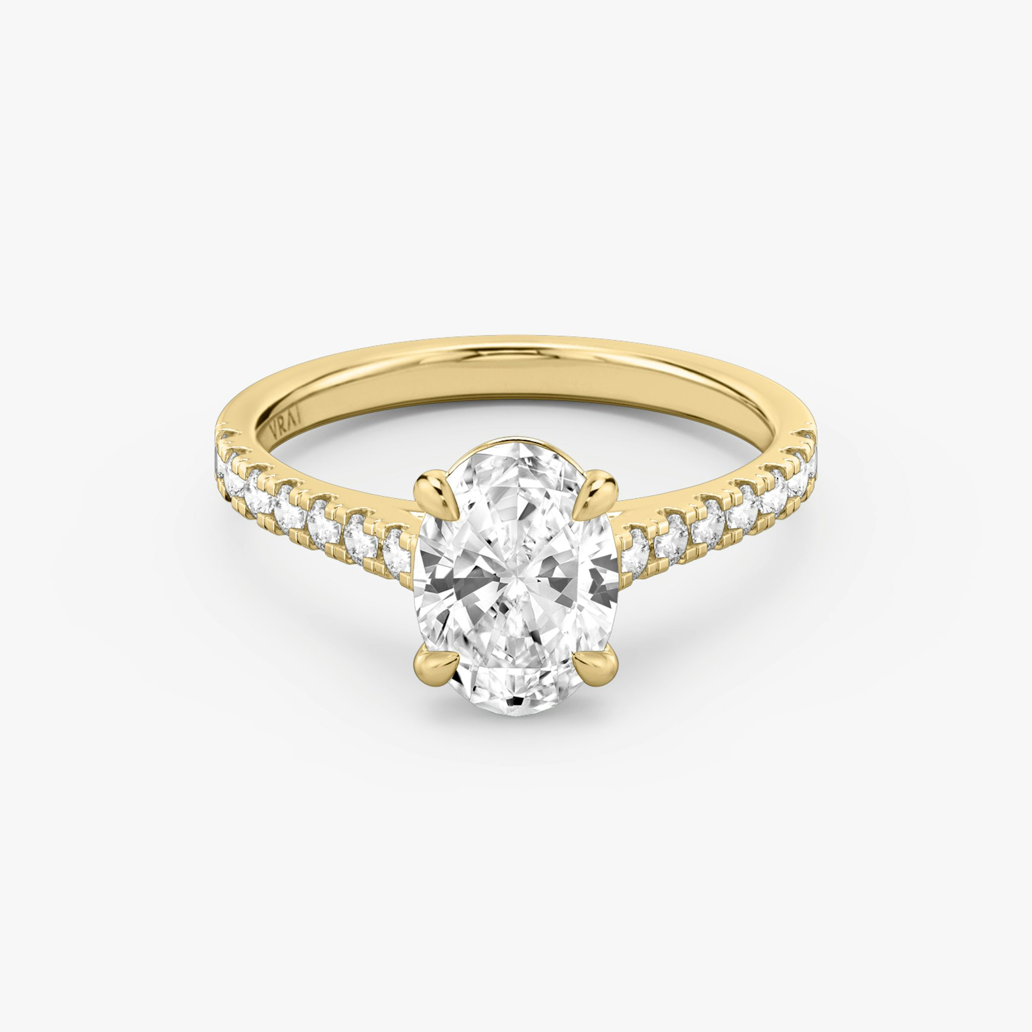 Yellow gold Cathedral engagement ring with Oval cut diamond