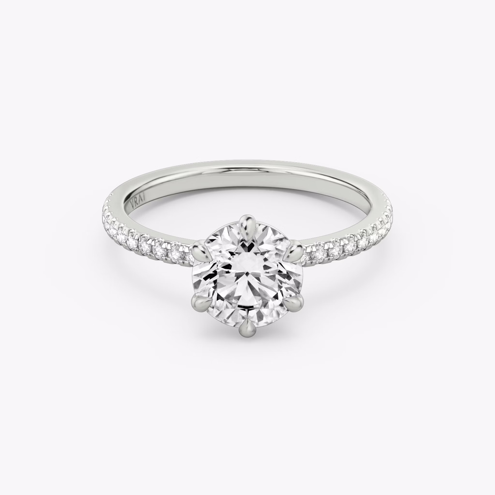 The signature 6 prong round brilliant engagement ring