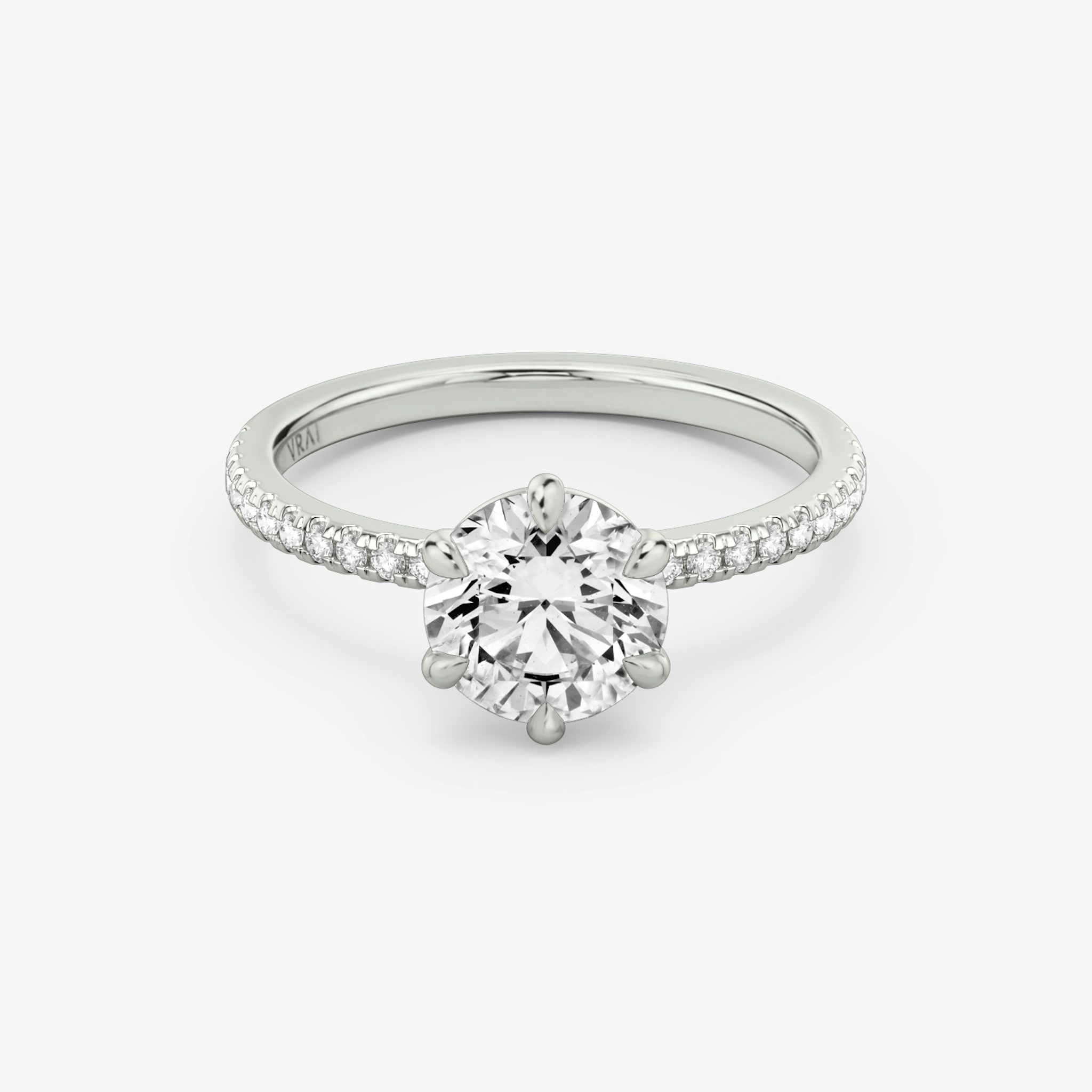 The signature 6 prong round brilliant engagement ring