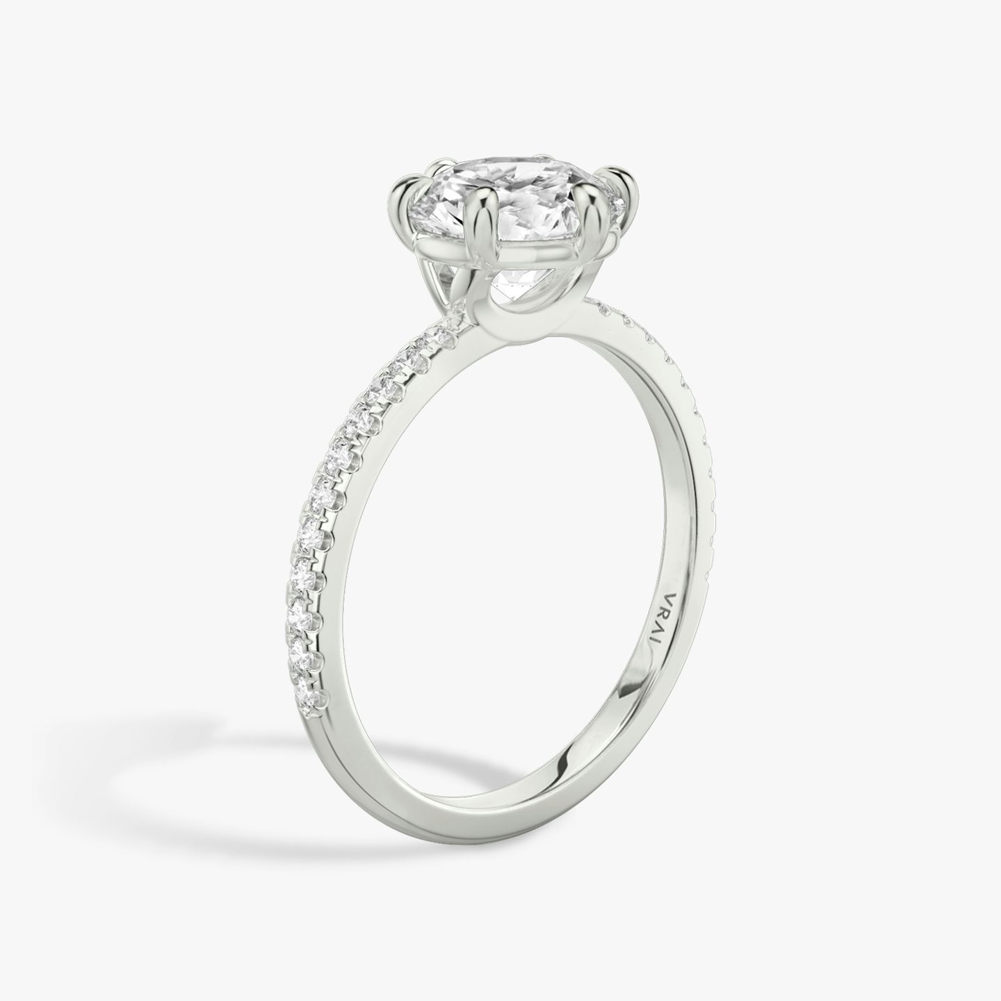 The Signature 6 Prong | Round Brilliant | Platinum | bandAccent: Pavé | bandWidth: standard | caratWeight: 1.0ct | hiddenHalo: no | diamondOrientation: vertical