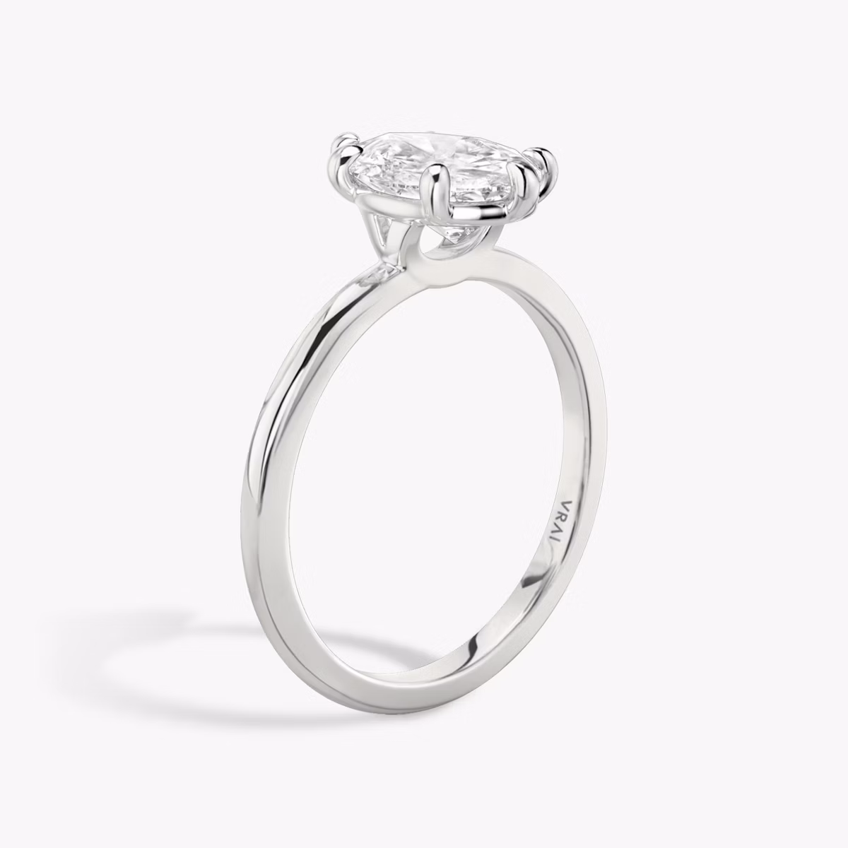 The Signature 6 Prong | Pear | Platinum | bandAccent: Plain | bandWidth: standard | hiddenHalo: no | diamondOrientation: vertical | caratWeight: other