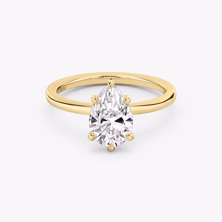 6-Prong Yellow Gold solitaire engagement ring with Pear cut diamond